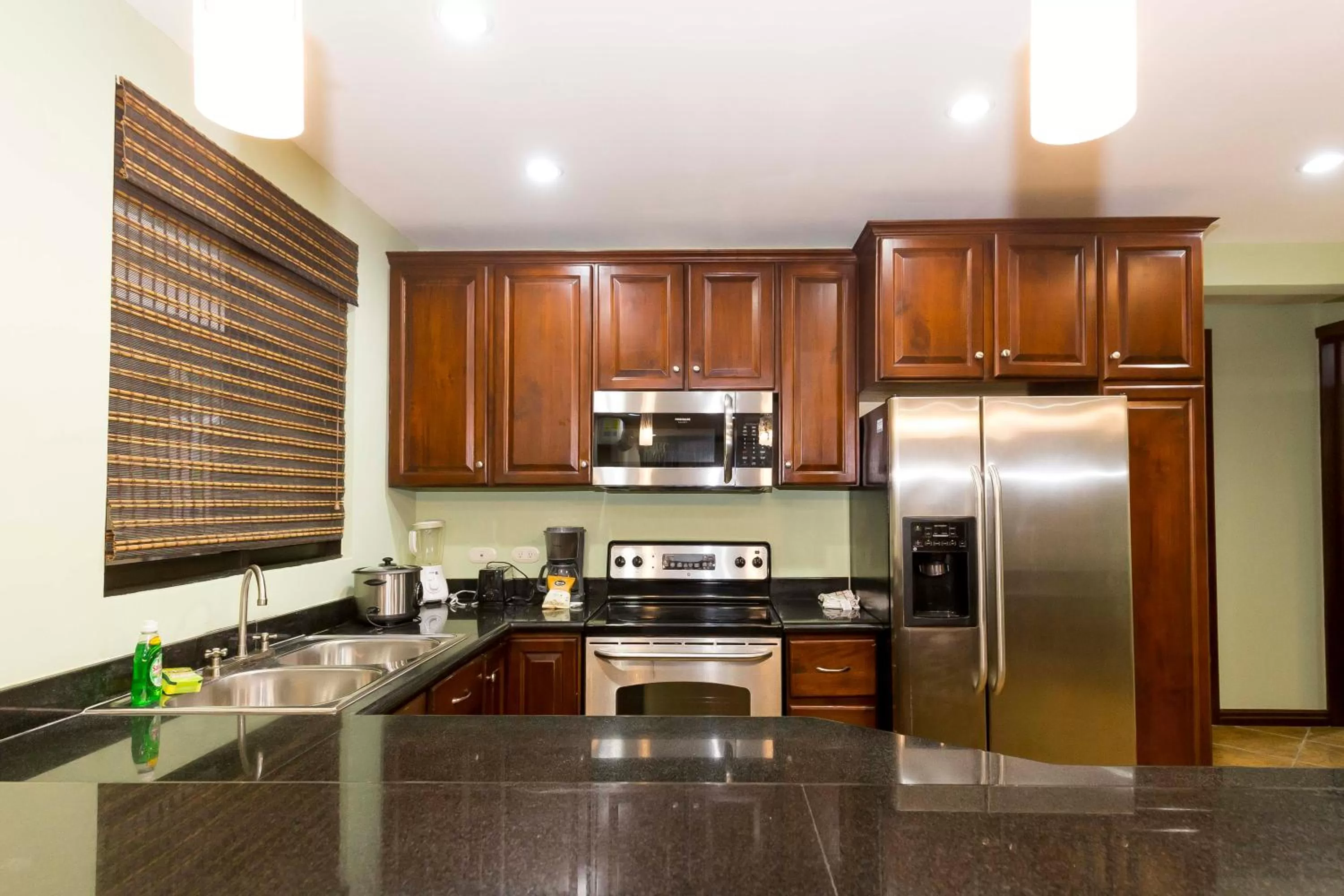 Kitchen or kitchenette in Monte Carlo Luxury Condominiums