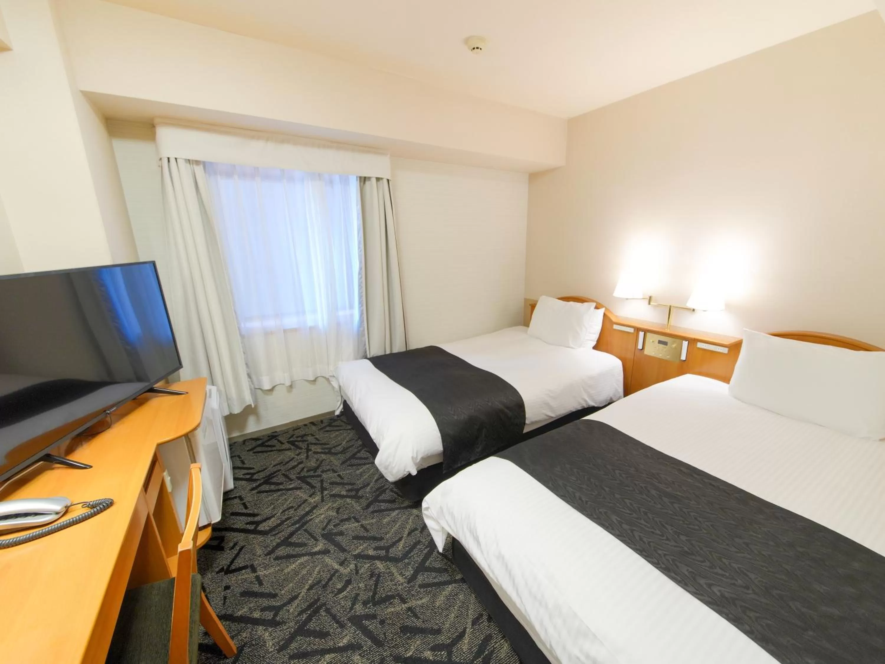 Photo of the whole room, Bed in APA Hotel Takasaki Ekimae