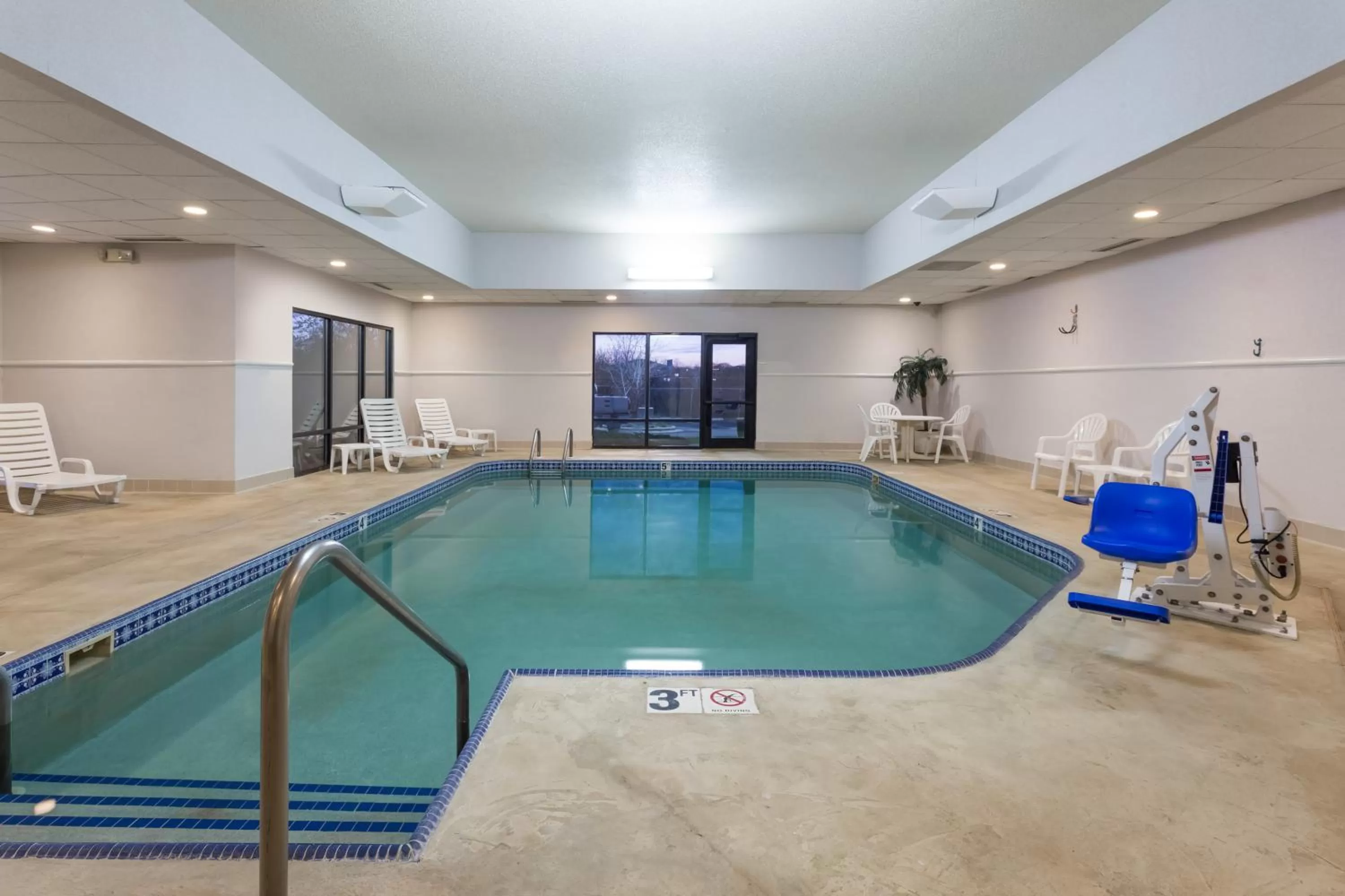 Swimming pool in Super 8 by Wyndham Germantown/Milwaukee