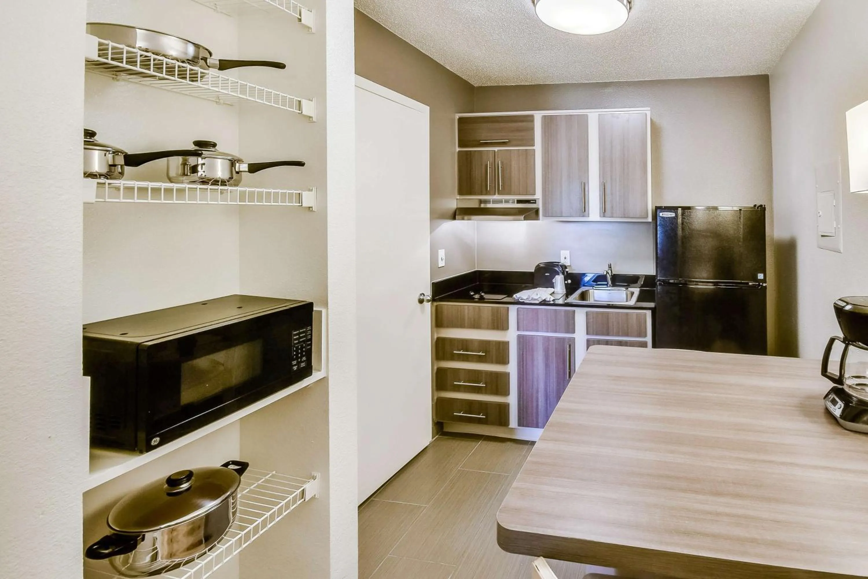 Kitchen or kitchenette in Studio 6-Houston, TX - Hobby South