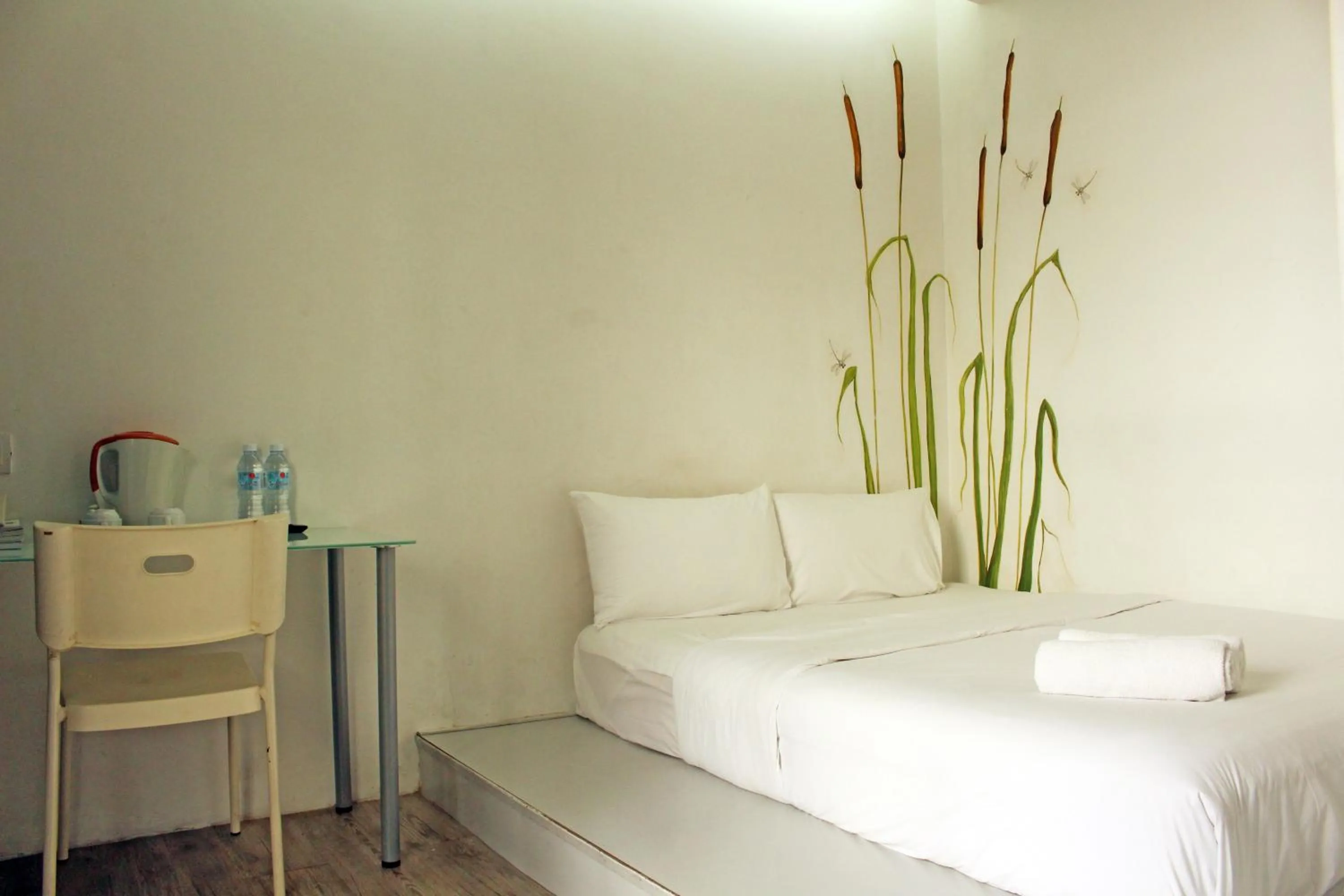 Bed in V Garden Hotel