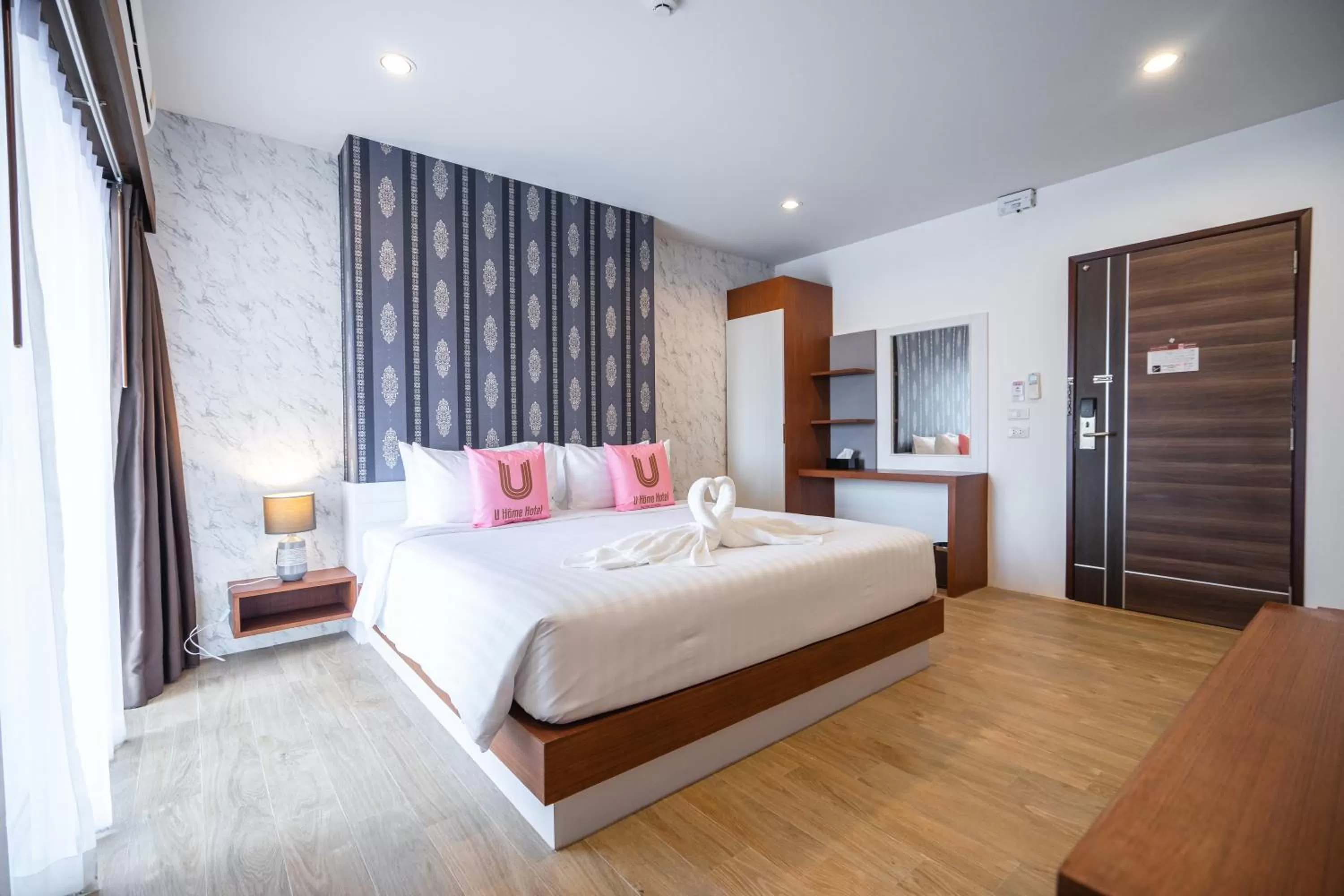 Bed in U- Homehotel Nakhonpanom