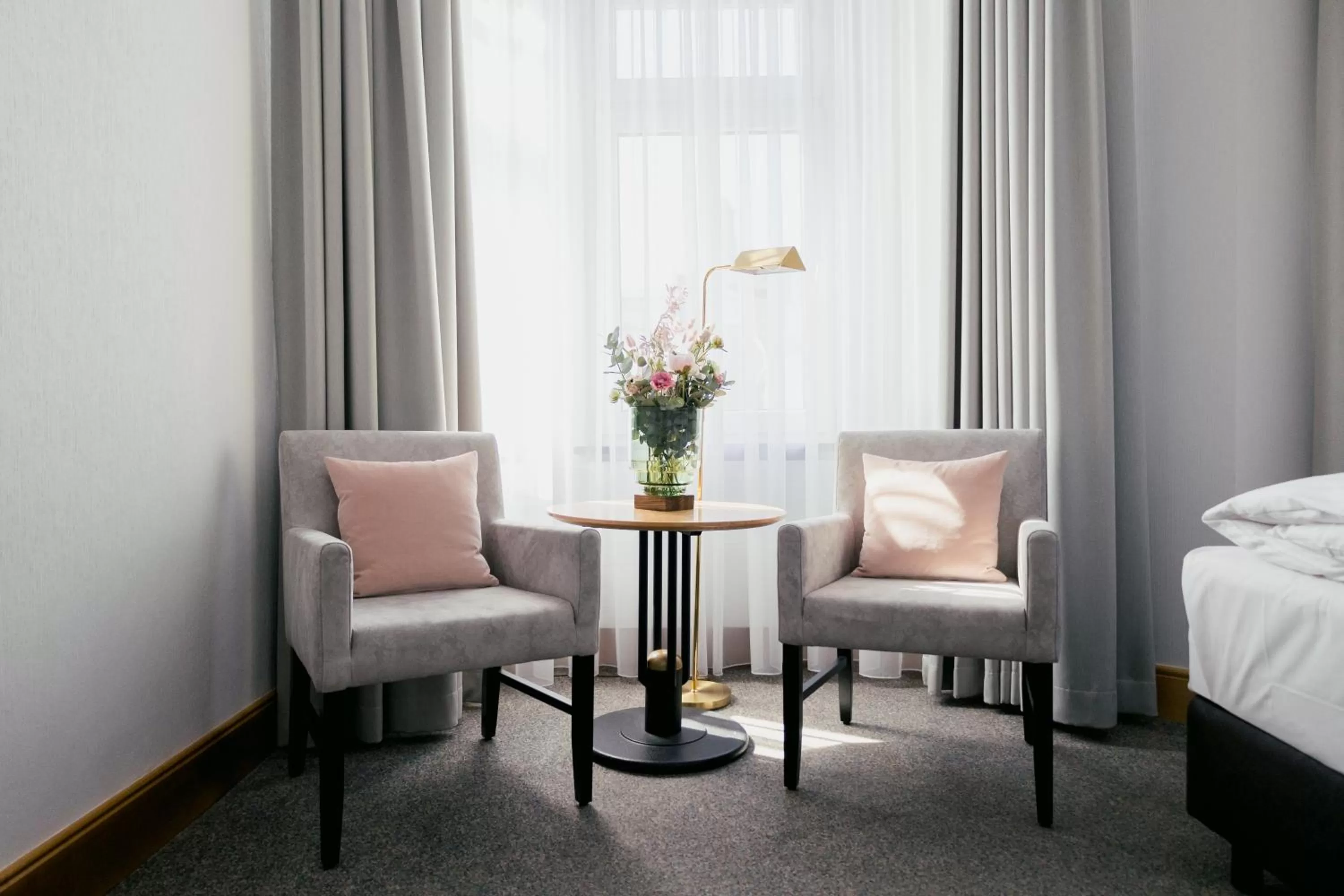 Seating area, Bed in DOM Hotel LIMBURG