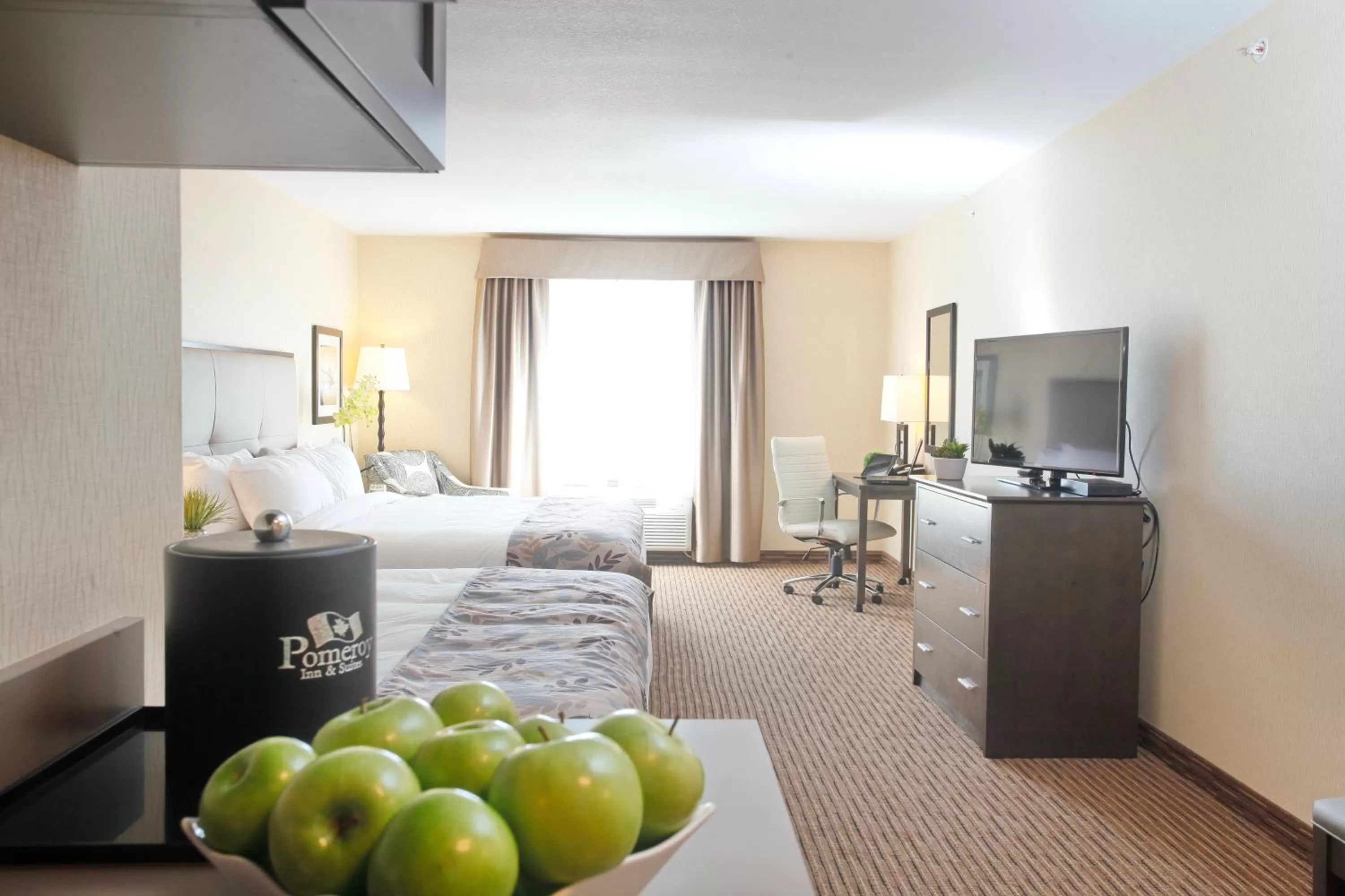 Photo of the whole room, Bed in Pomeroy Inn & Suites at Olds College