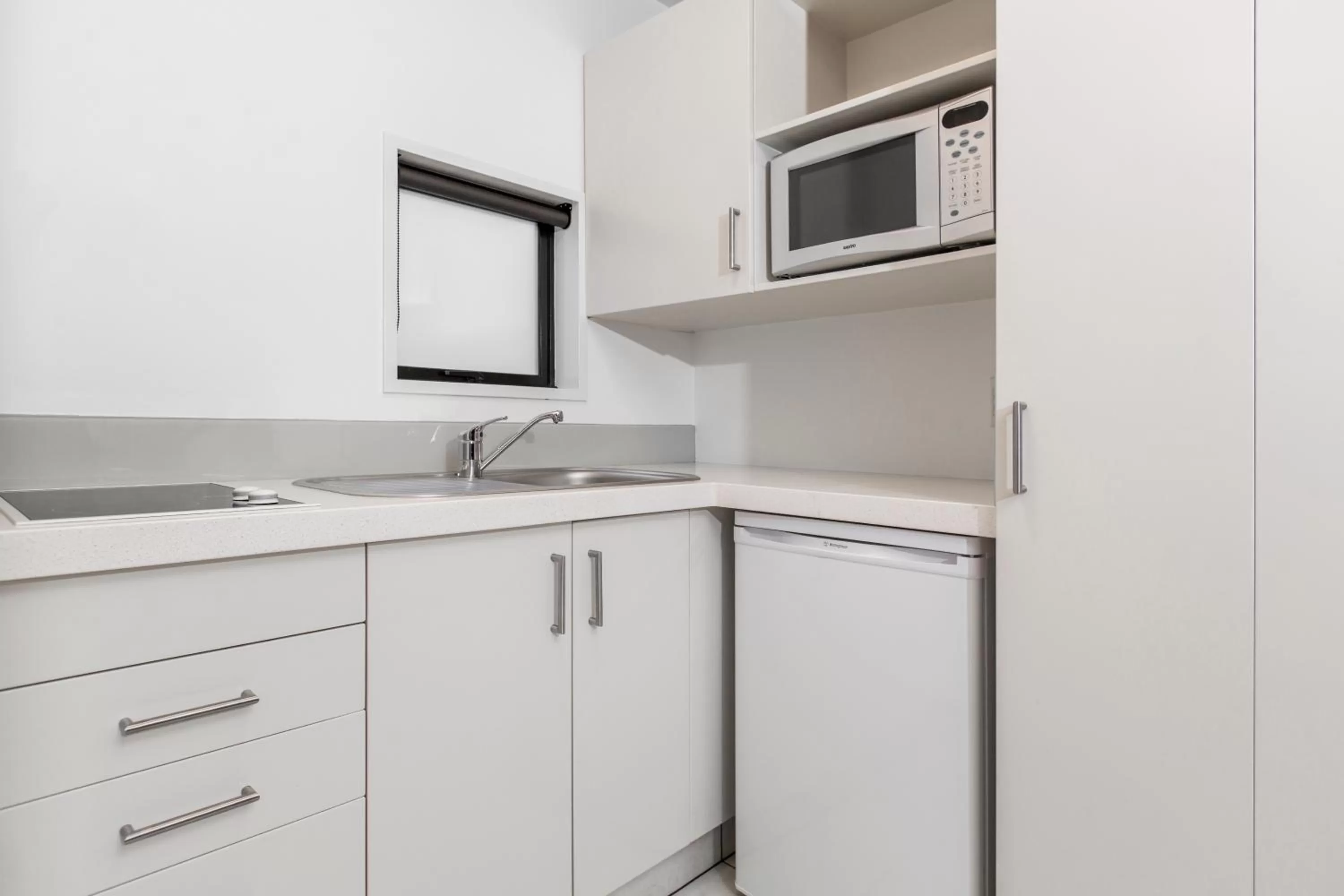 Kitchen or kitchenette in Palms Motel