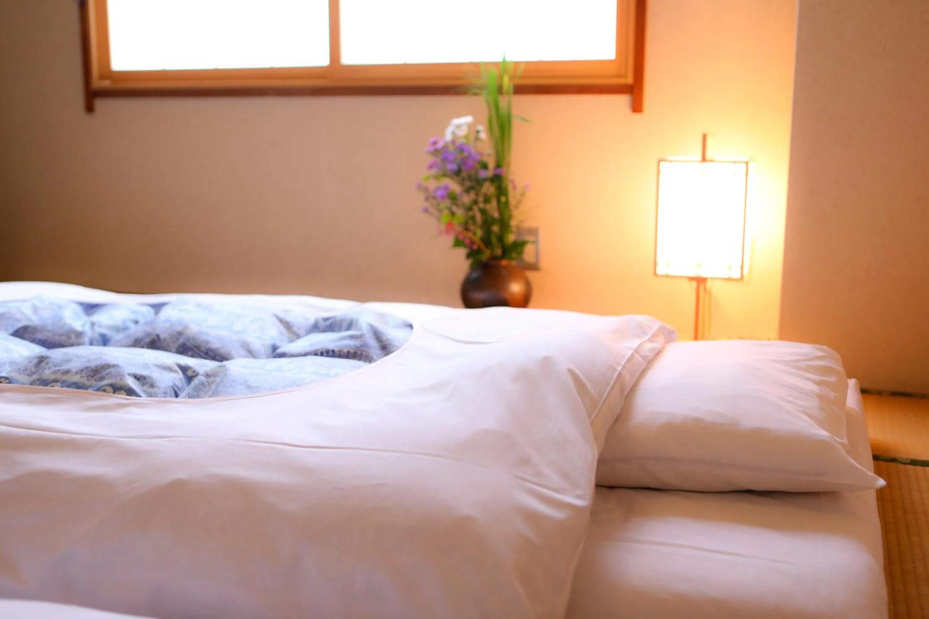 Bed in Ryokan Kamogawa Asakusa