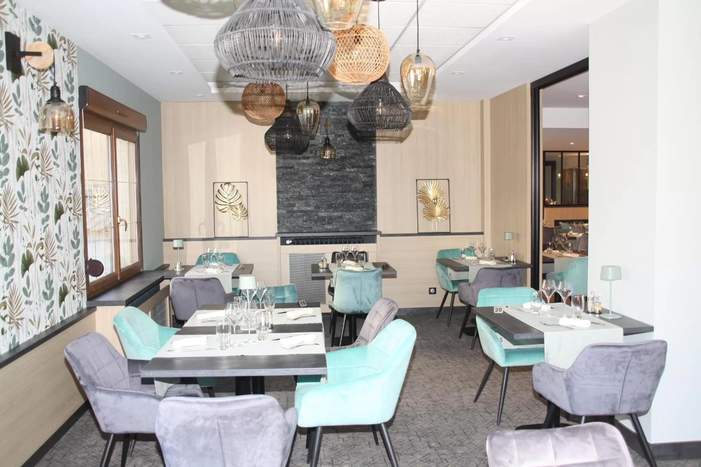 Seating area in Logis Hôtel- Restaurant La Renaissance