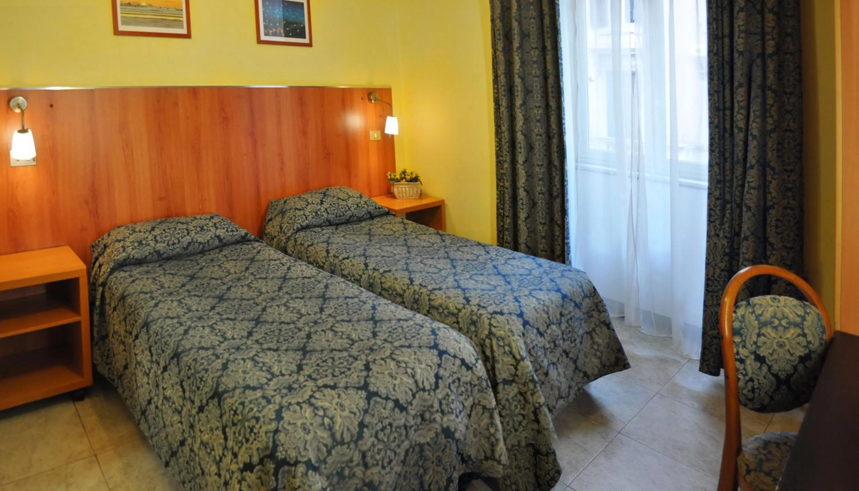 Bed in Hotel Fiorenza