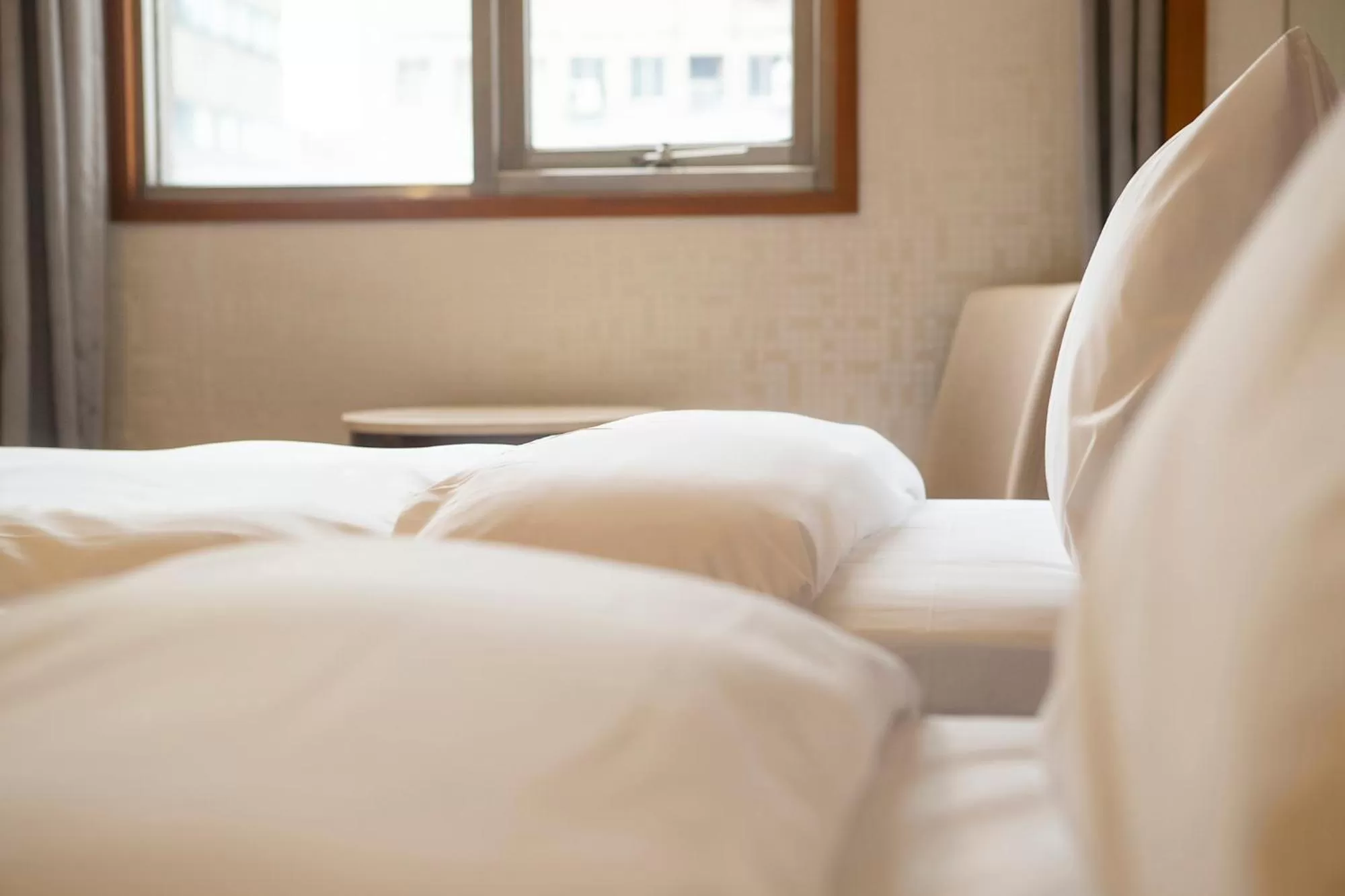 Bed in Hej Taipei Arena Hotel