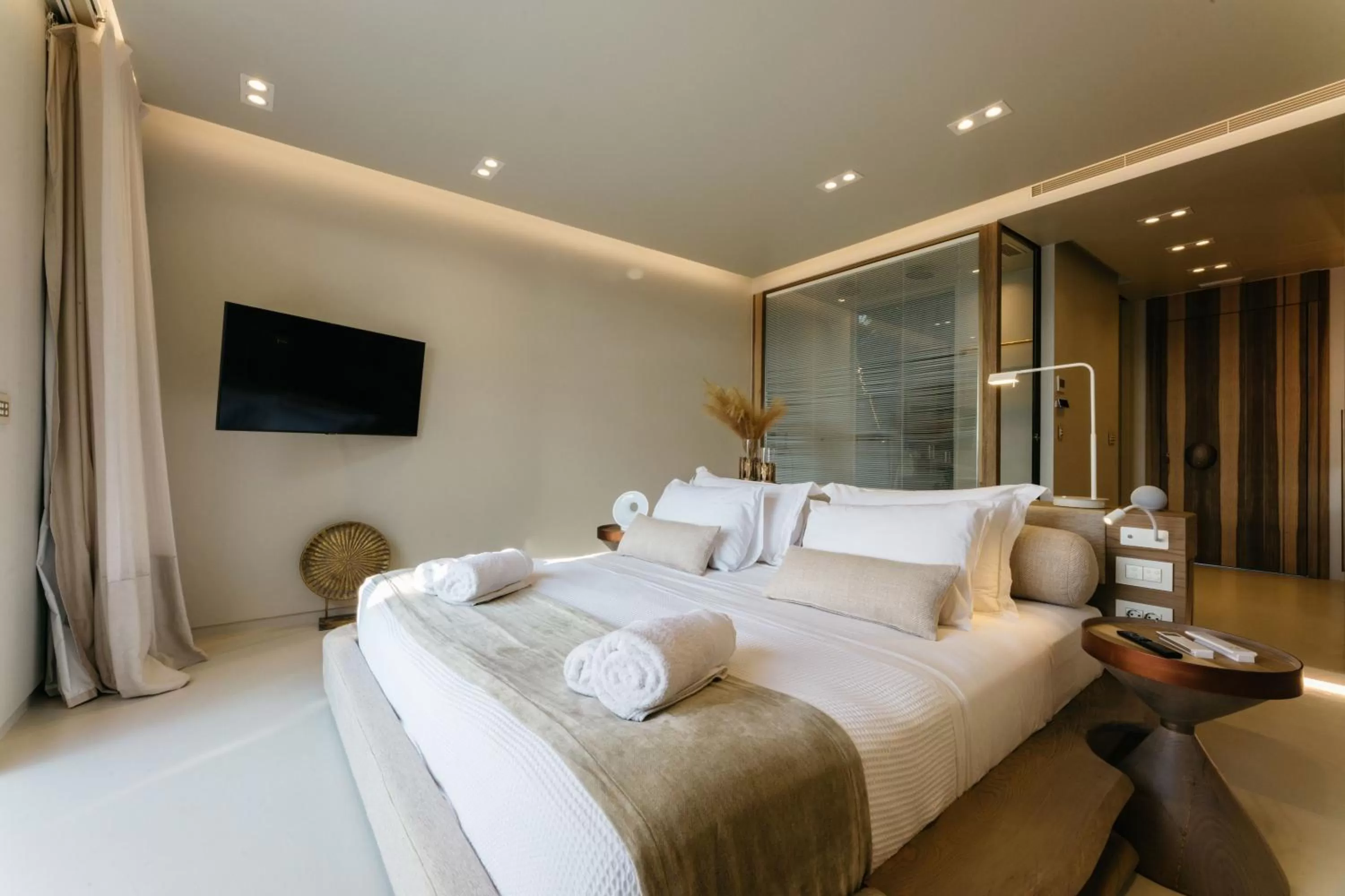 Bed in Avgoustos Suites Naxos