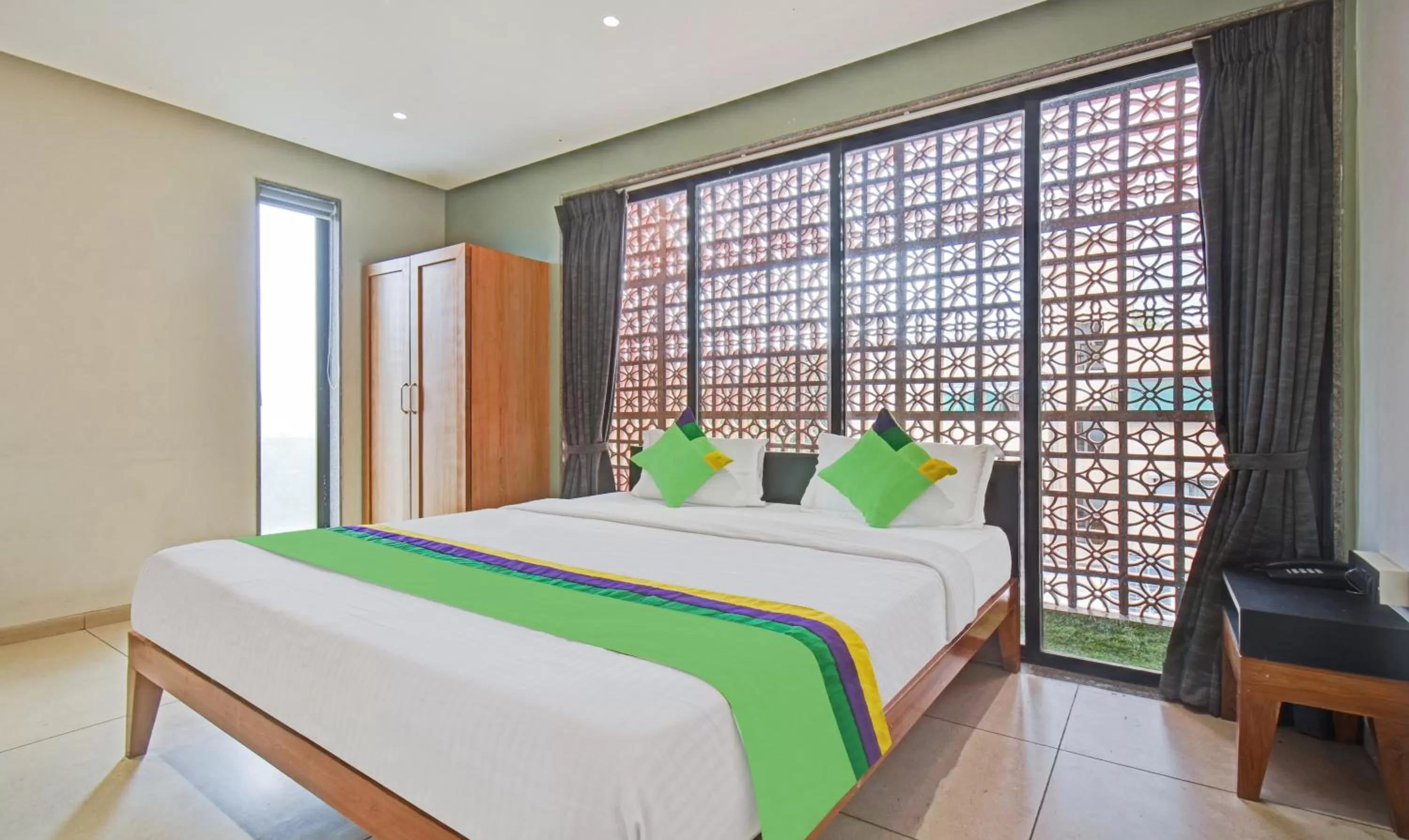 Bedroom, Bed in Treebo Aroma Executive