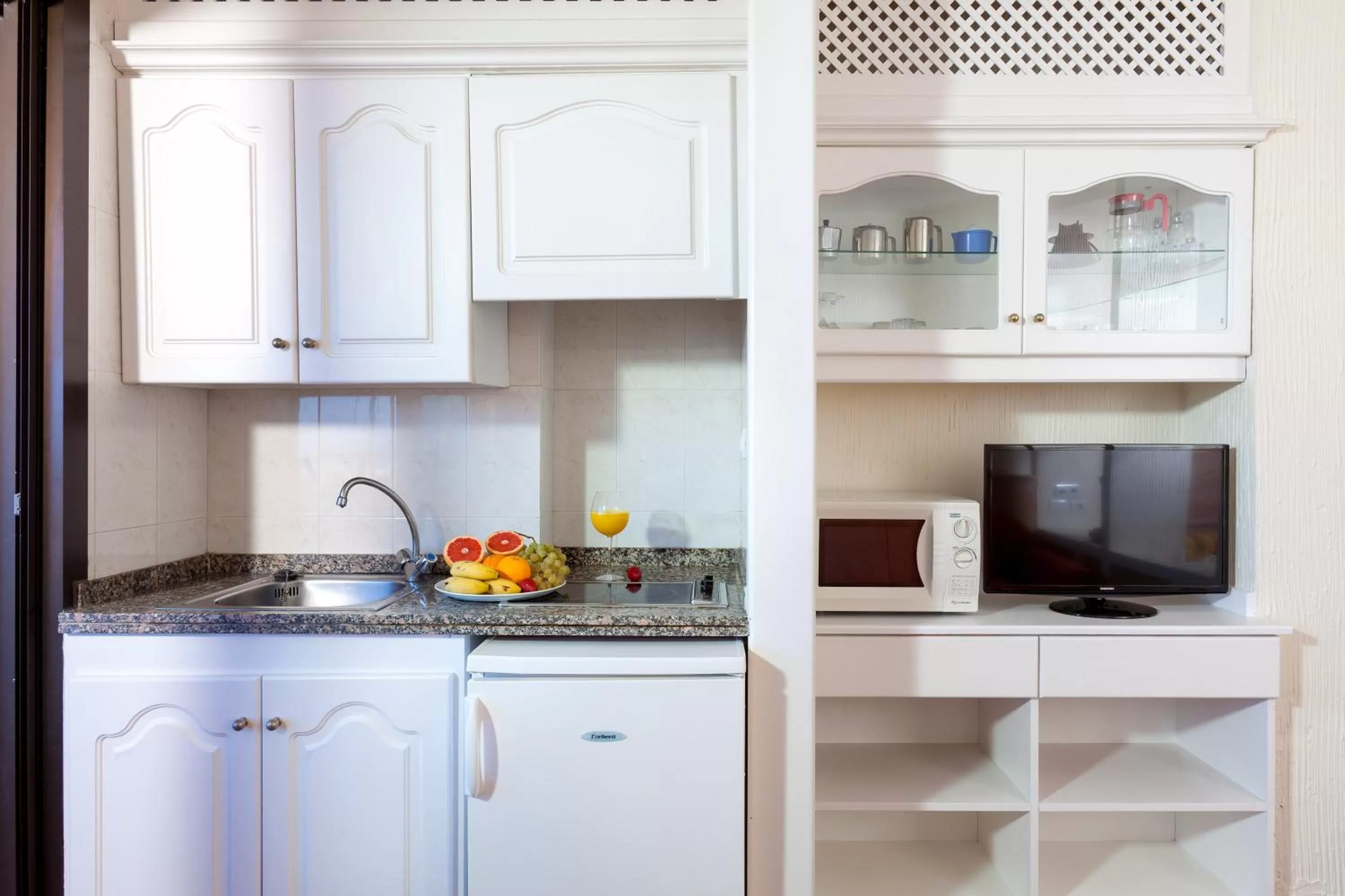 Kitchen or kitchenette in Apartamentos Masaru