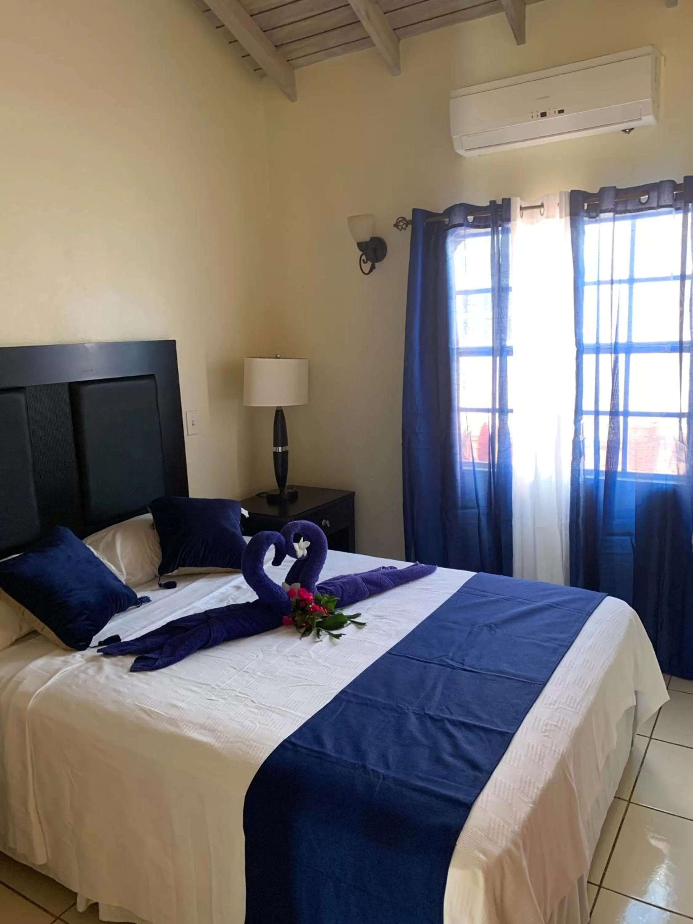 Bed in Connie's Comfort Suites