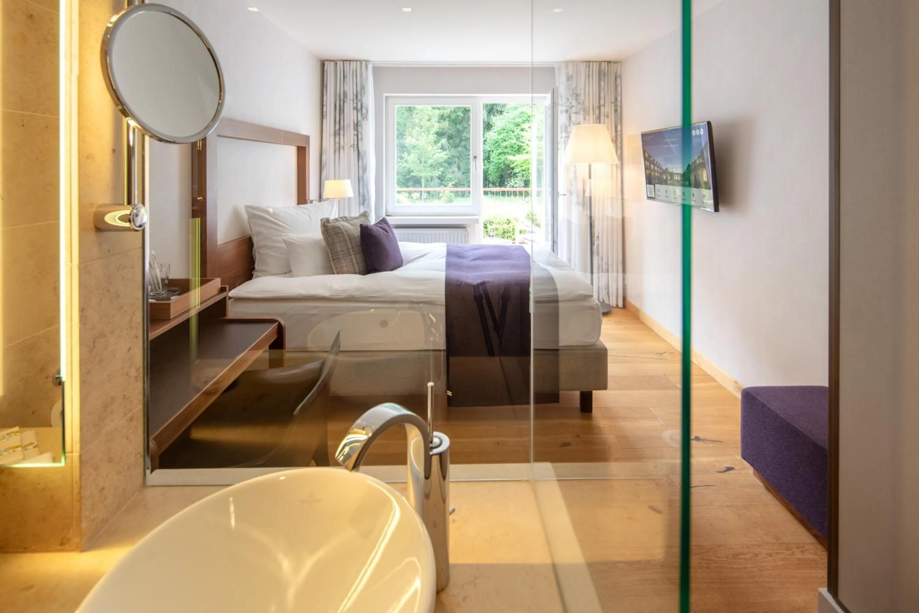 Photo of the whole room, Bed in Waldhotel Stuttgart