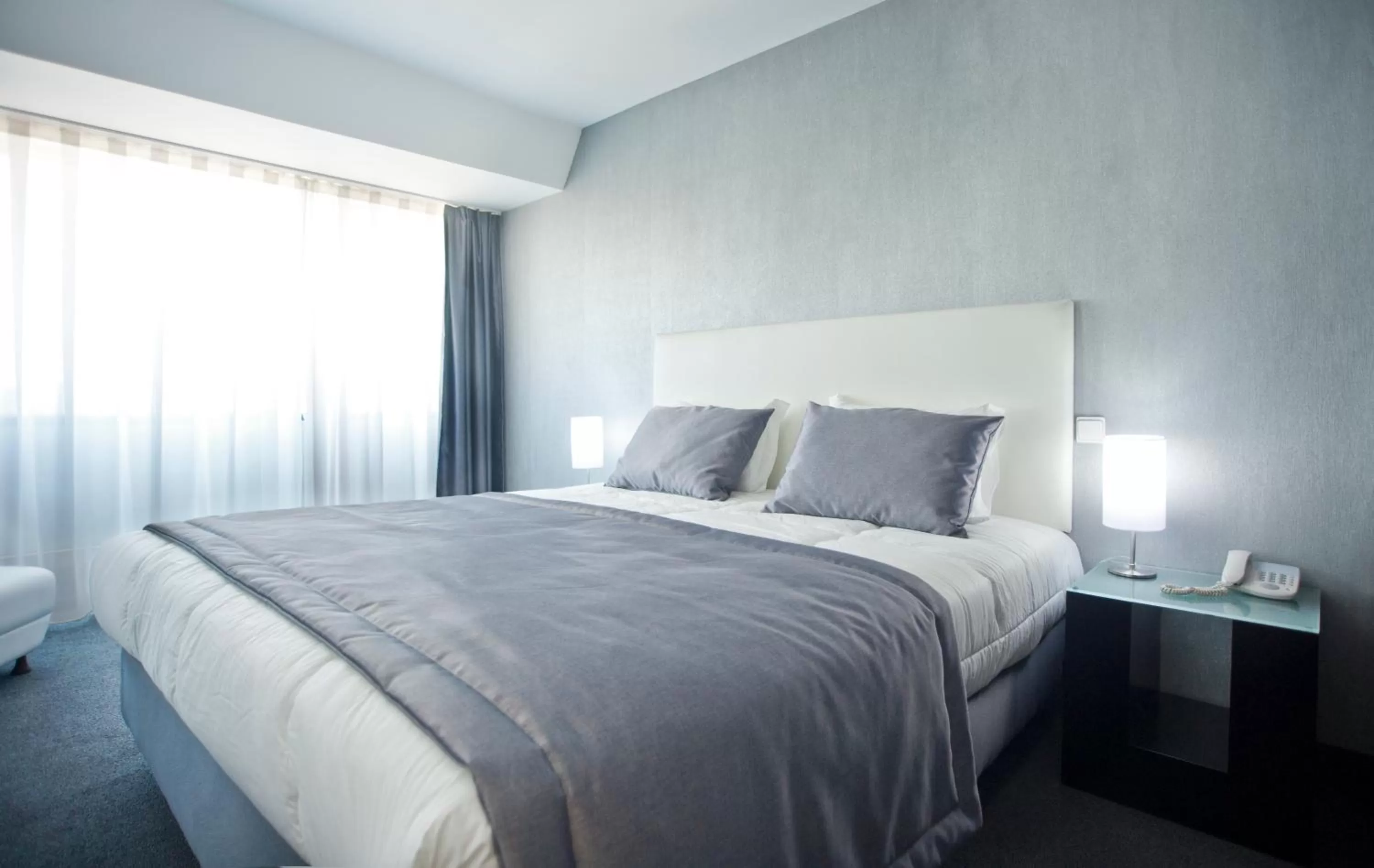 Bed in Miramar Hotel Spa & Apartments