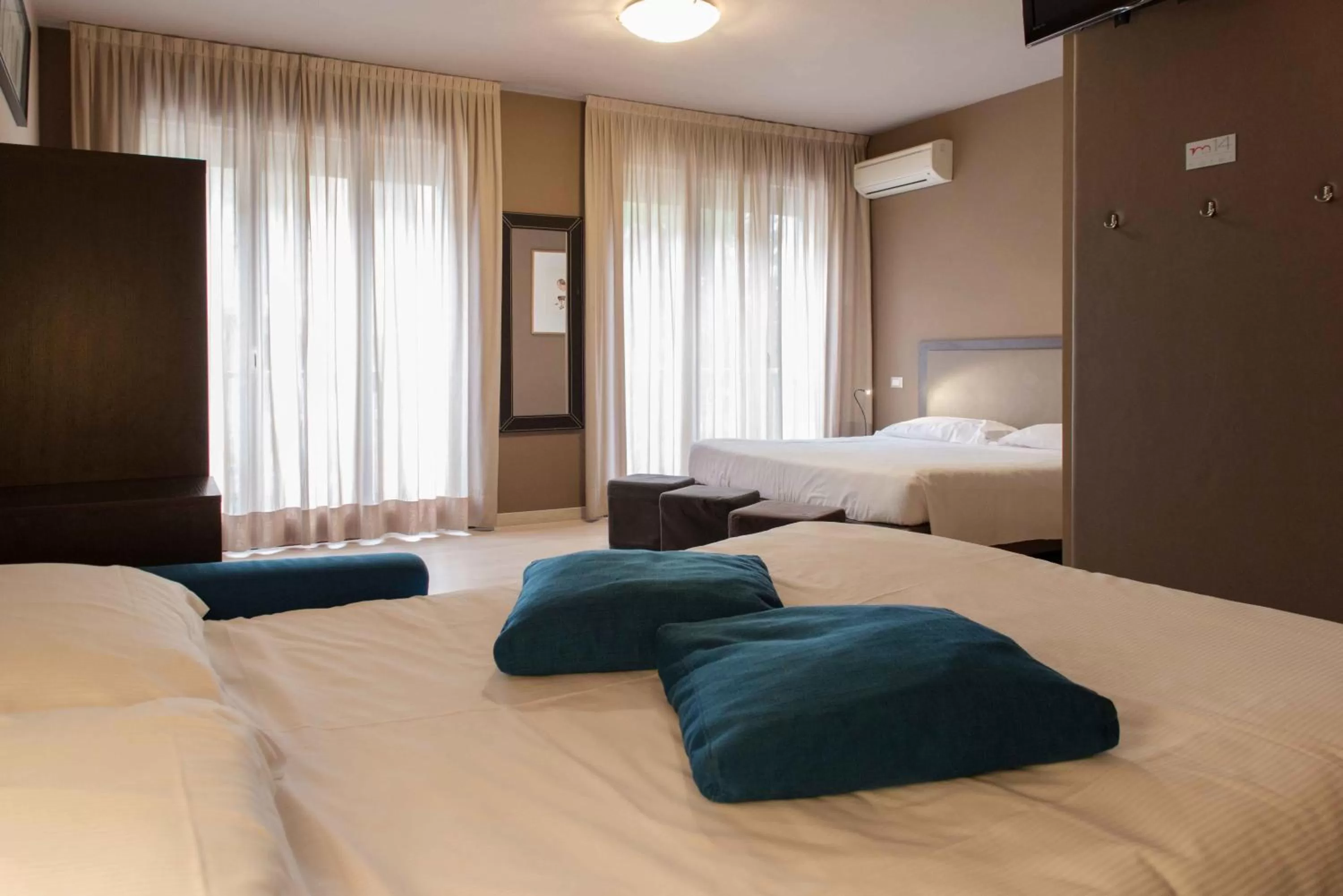 Bed in M14 Hotel & Spa