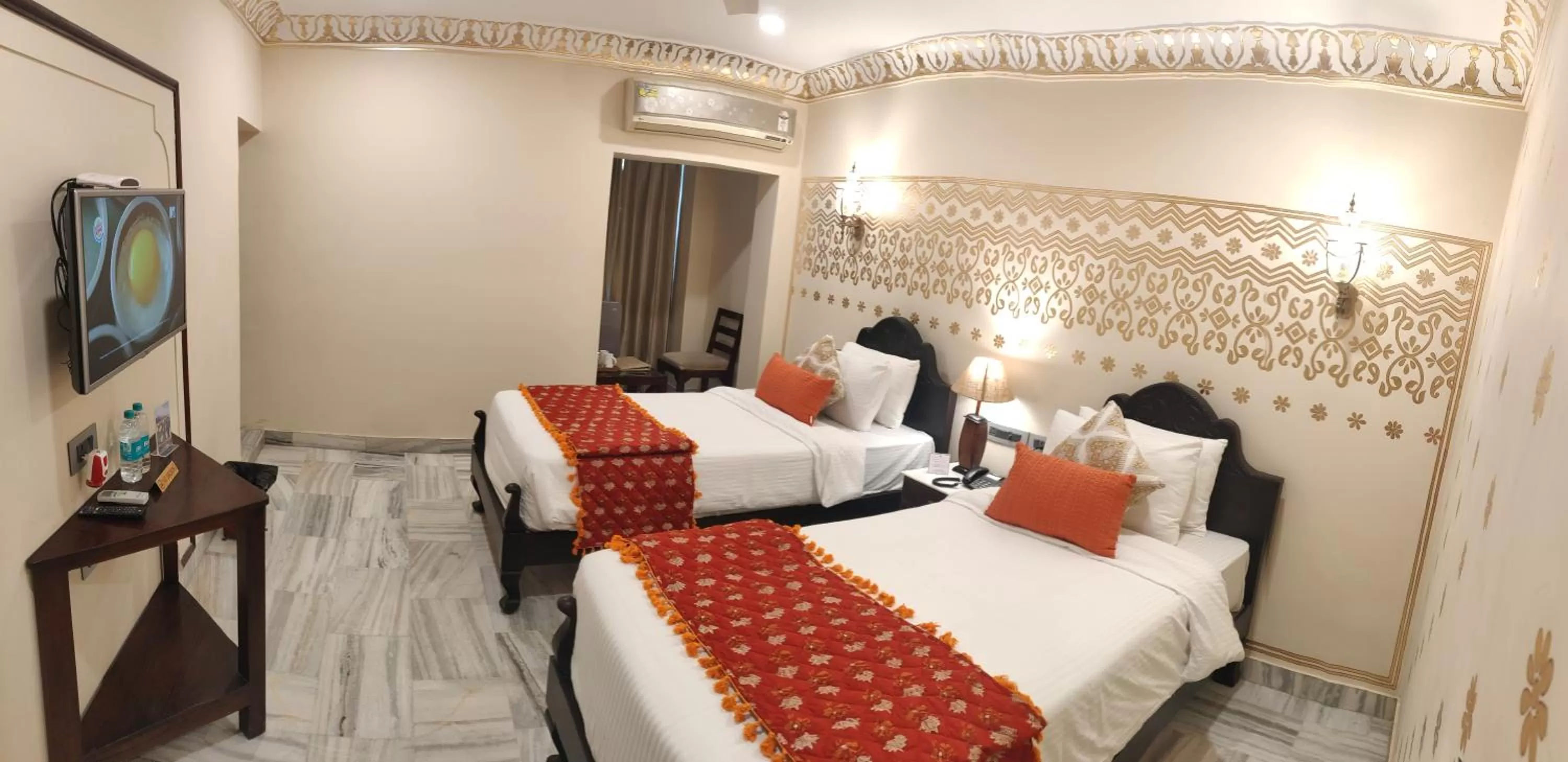 Bed in Laxmi Palace Heritage Boutique Hotel