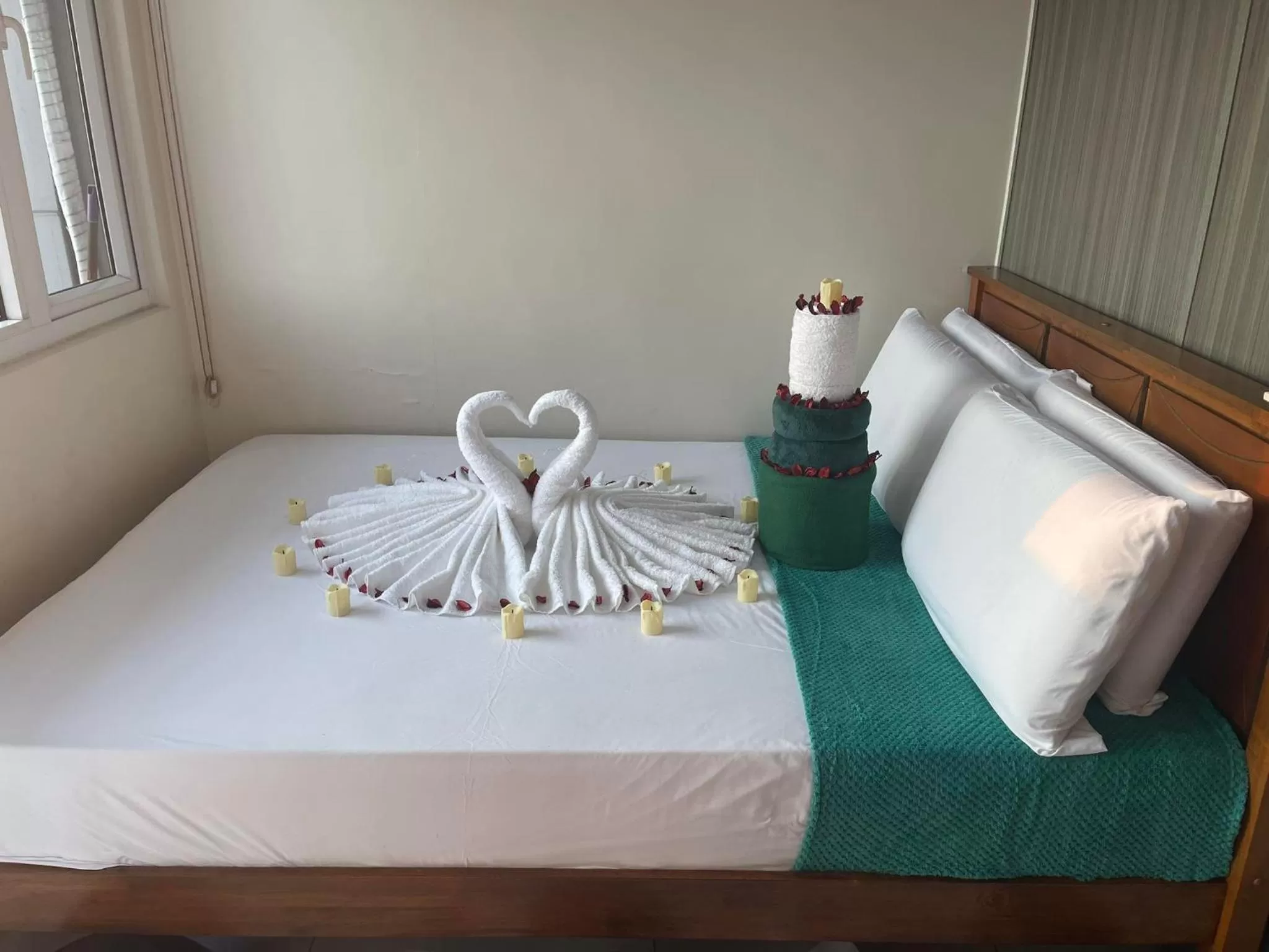 Bed in Green Residences Stays by PBYY