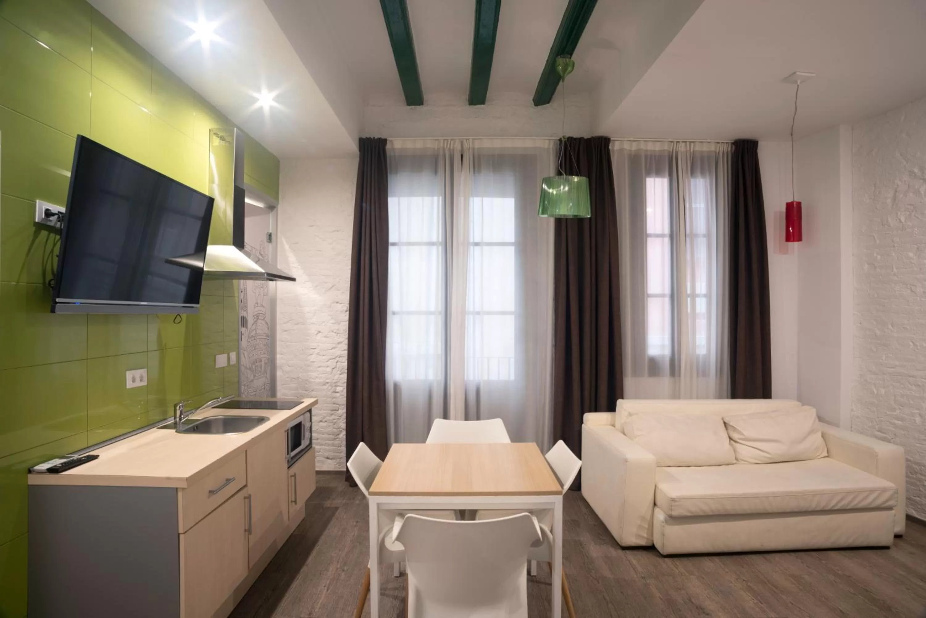 Kitchen or kitchenette in Petit Palace Boqueria Garden