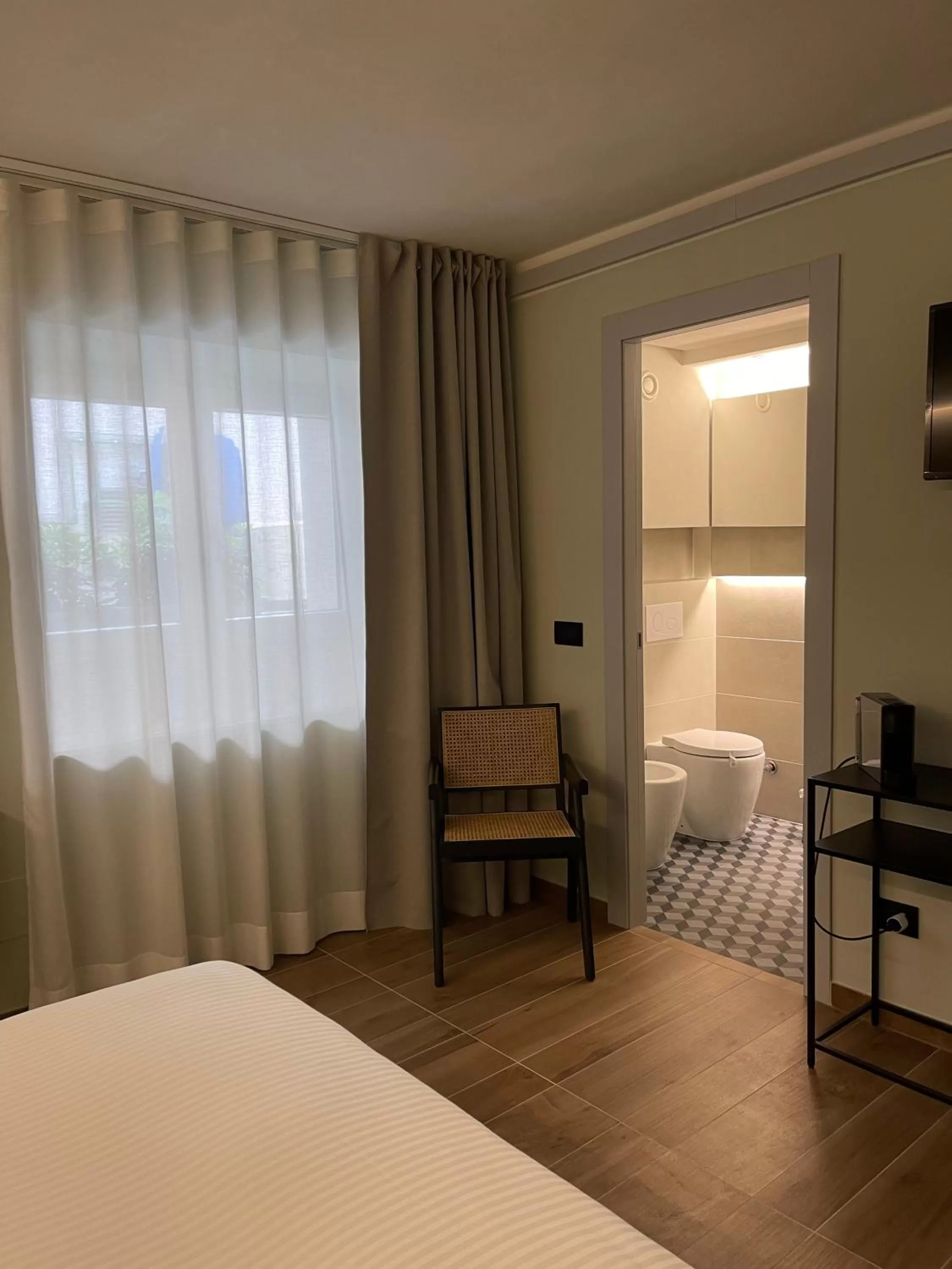 Photo of the whole room, Seating Area in Raha Suites