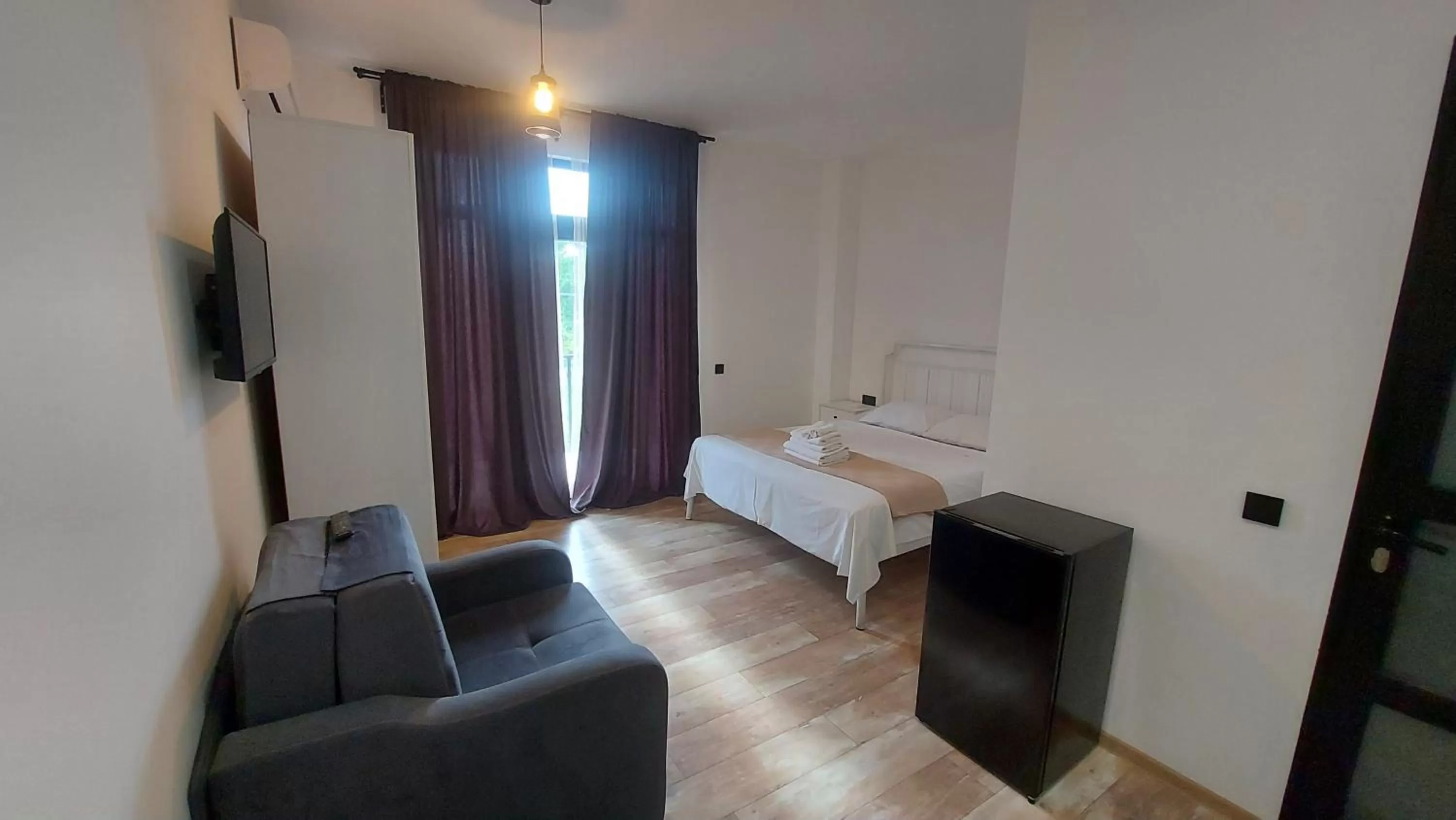 Bedroom, Seating Area in Level Up Hotel & Restaurant