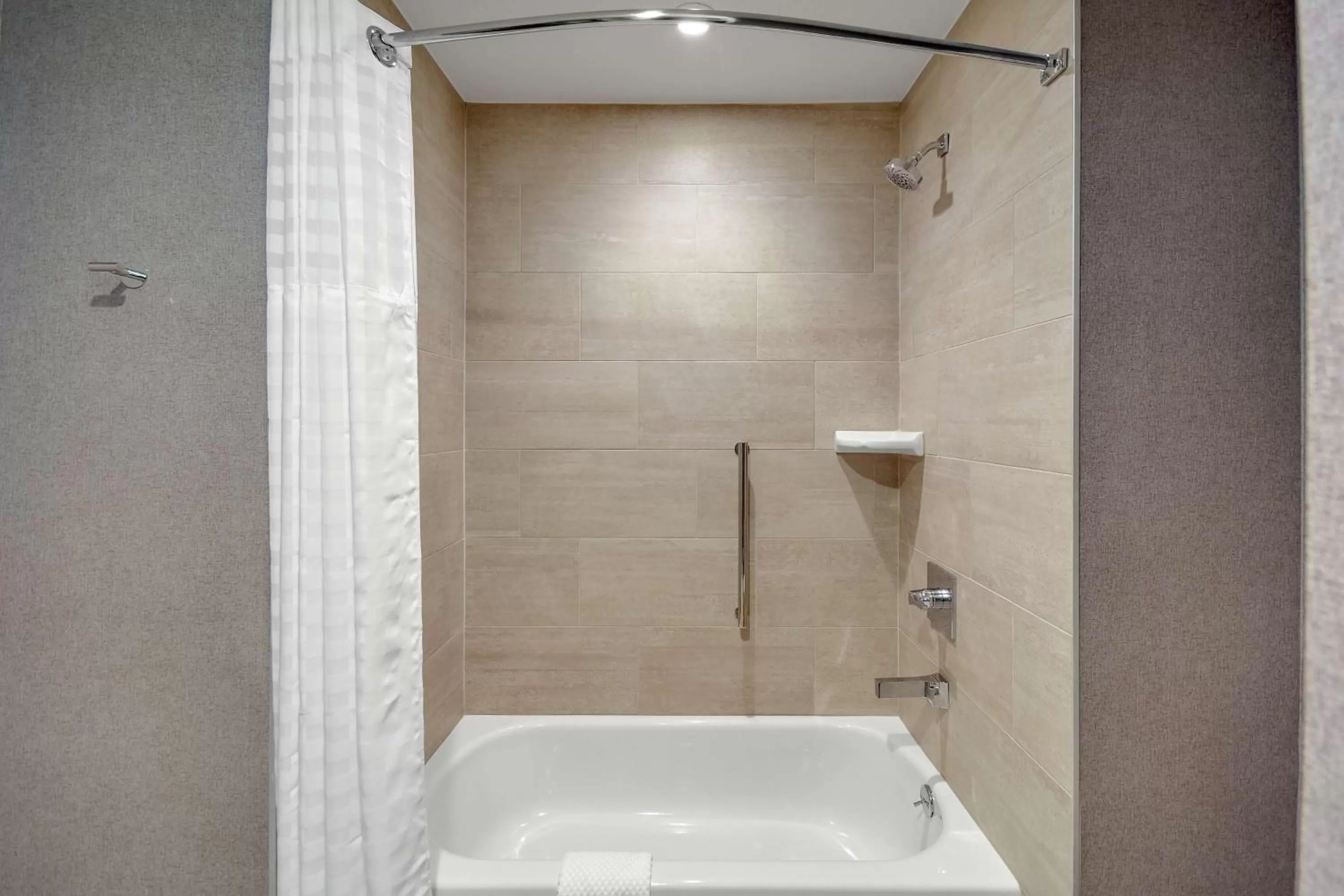 Bathroom in Embassy Suites by Hilton Jonesboro Red Wolf Convention Center