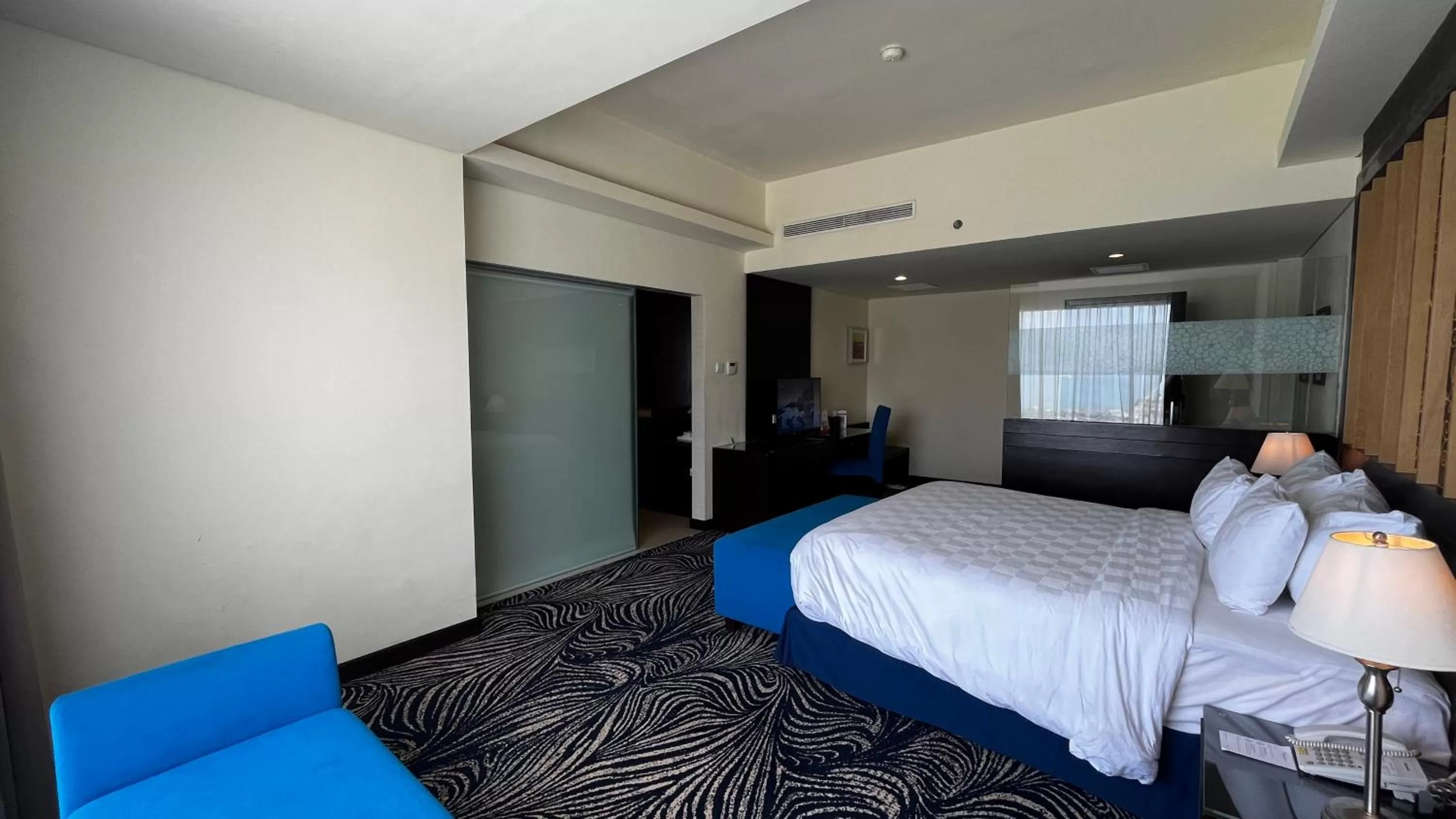 TV and multimedia, Bed in Swiss-Belhotel Silae Palu
