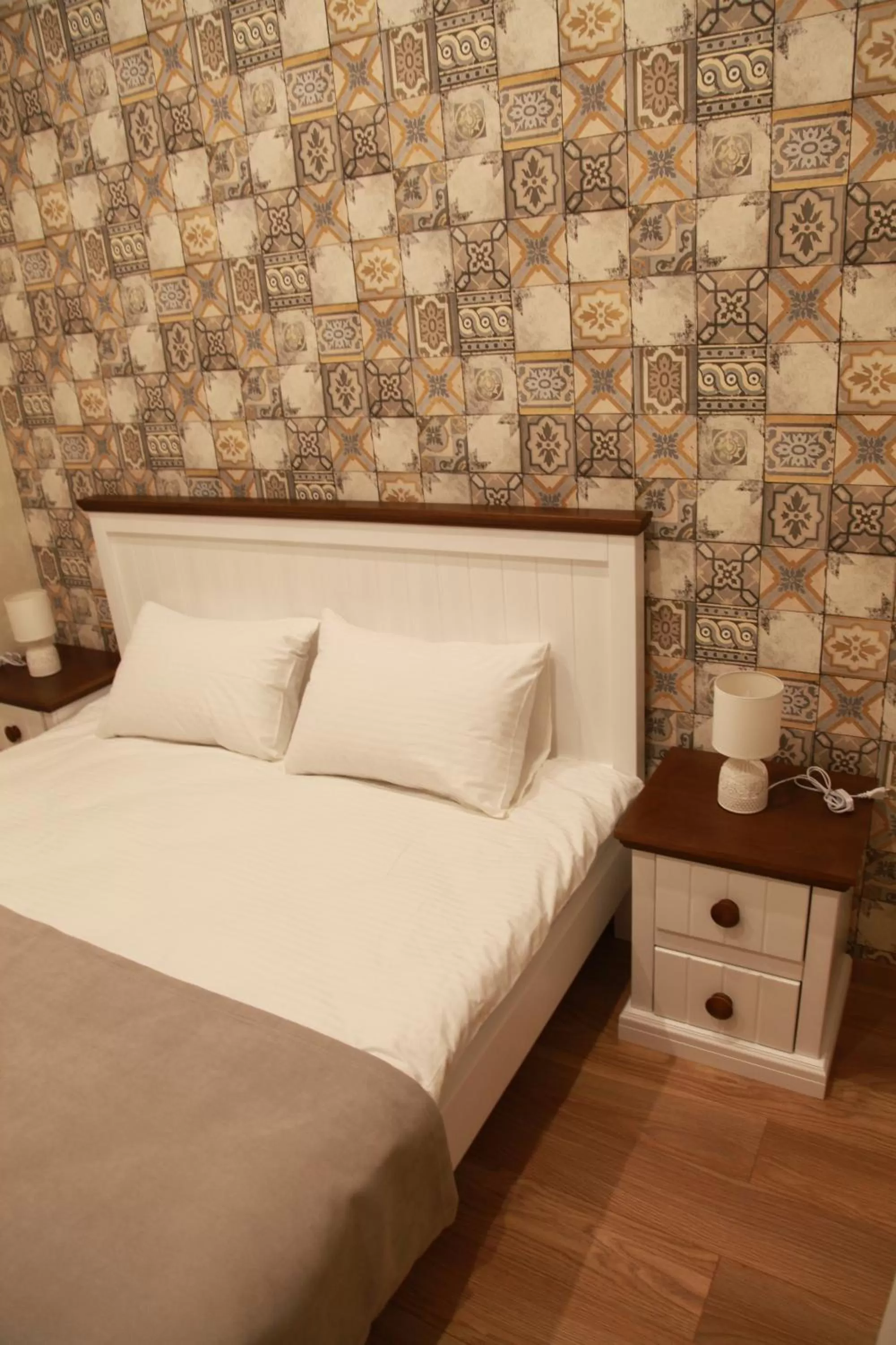 Bed in WINE & ROSE BOUTIQUE HOTEL