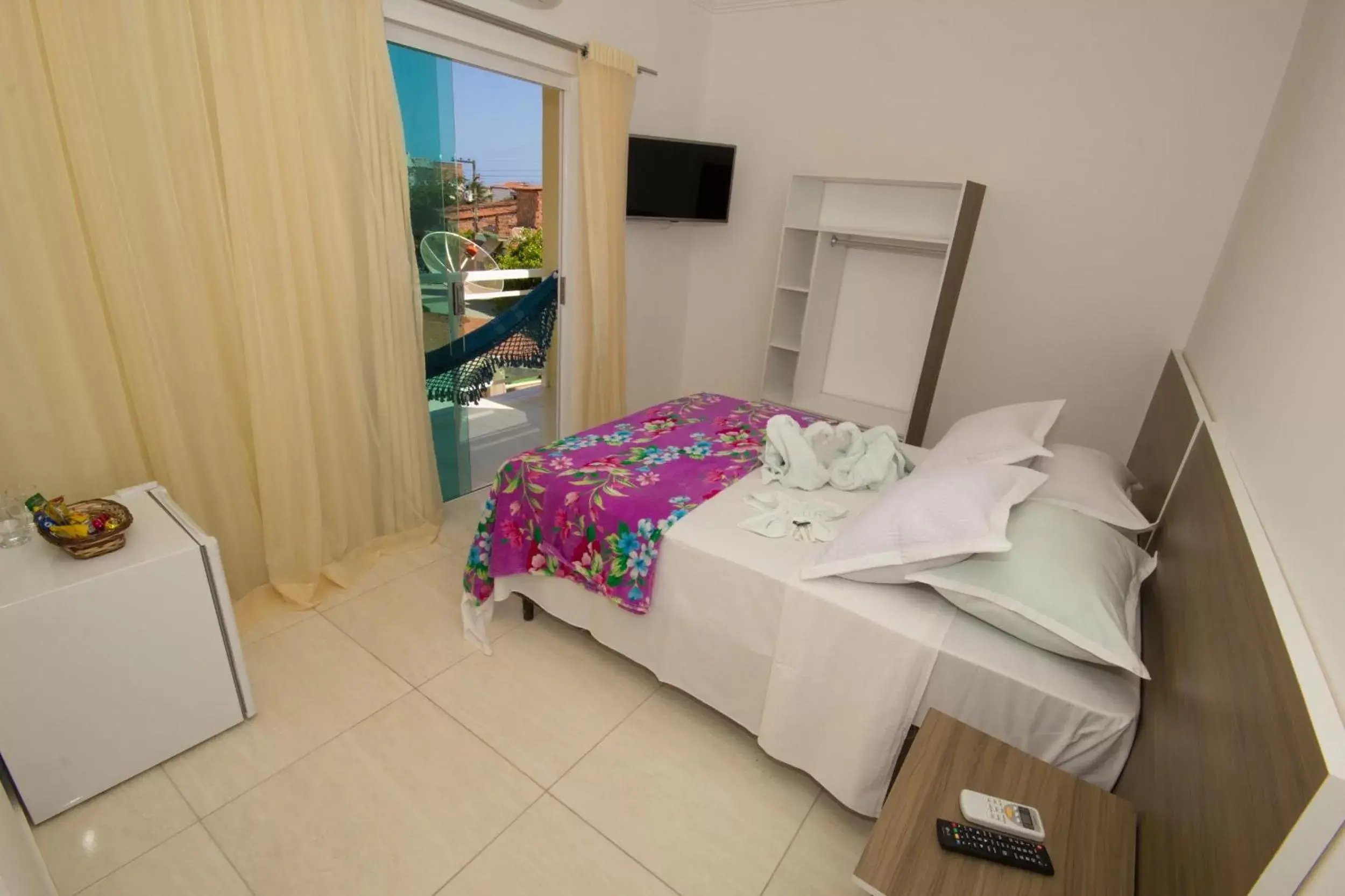 Apartamento com Varanda de Frente ou Lateral in Pousada Verdes Mares Apartamento com Varanda de Frente ou Lateral in Pousada Verdes Mares