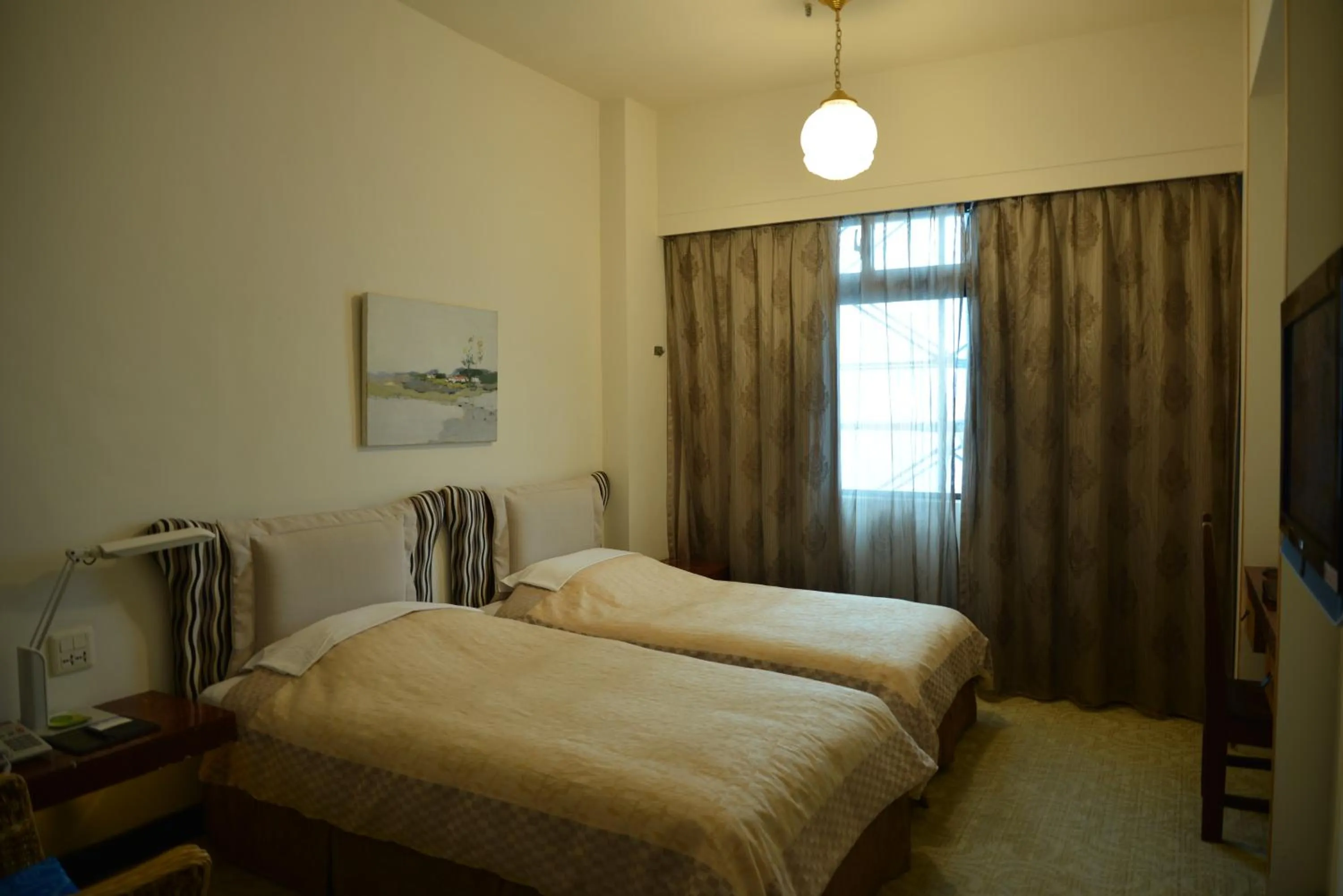 Bed in Kingship Hotel Kaohsiung Inter Continental