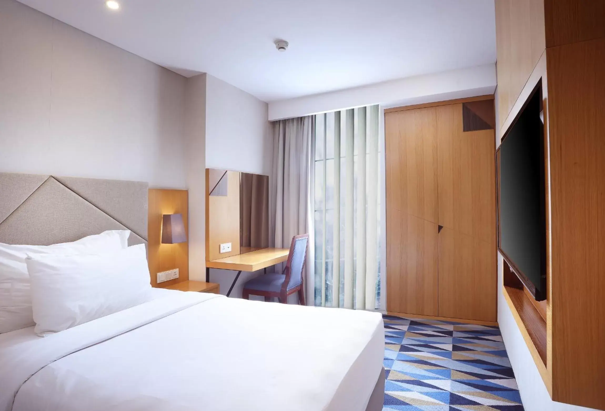 Two-Bedroom Family Suite with Queen and Single Beds in Swiss-Belhotel Pondok Indah Two-Bedroom Family Suite with Queen and Single Beds in Swiss-Belhotel Pondok Indah