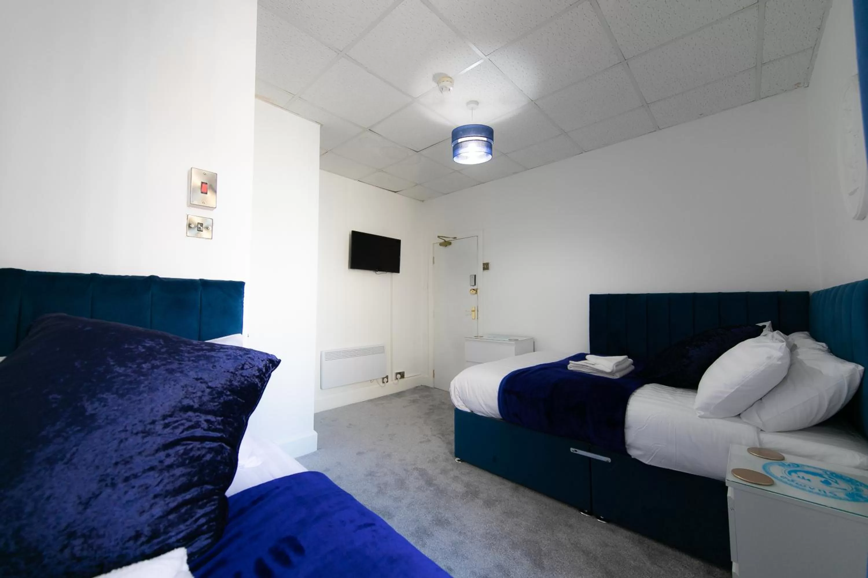 Bed in The New Apollo Hotel