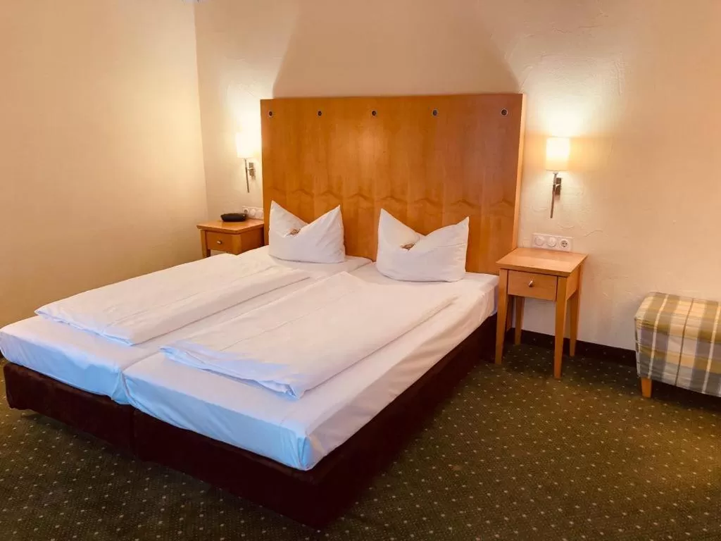 Bed in Hotel Rosenheimer Hof