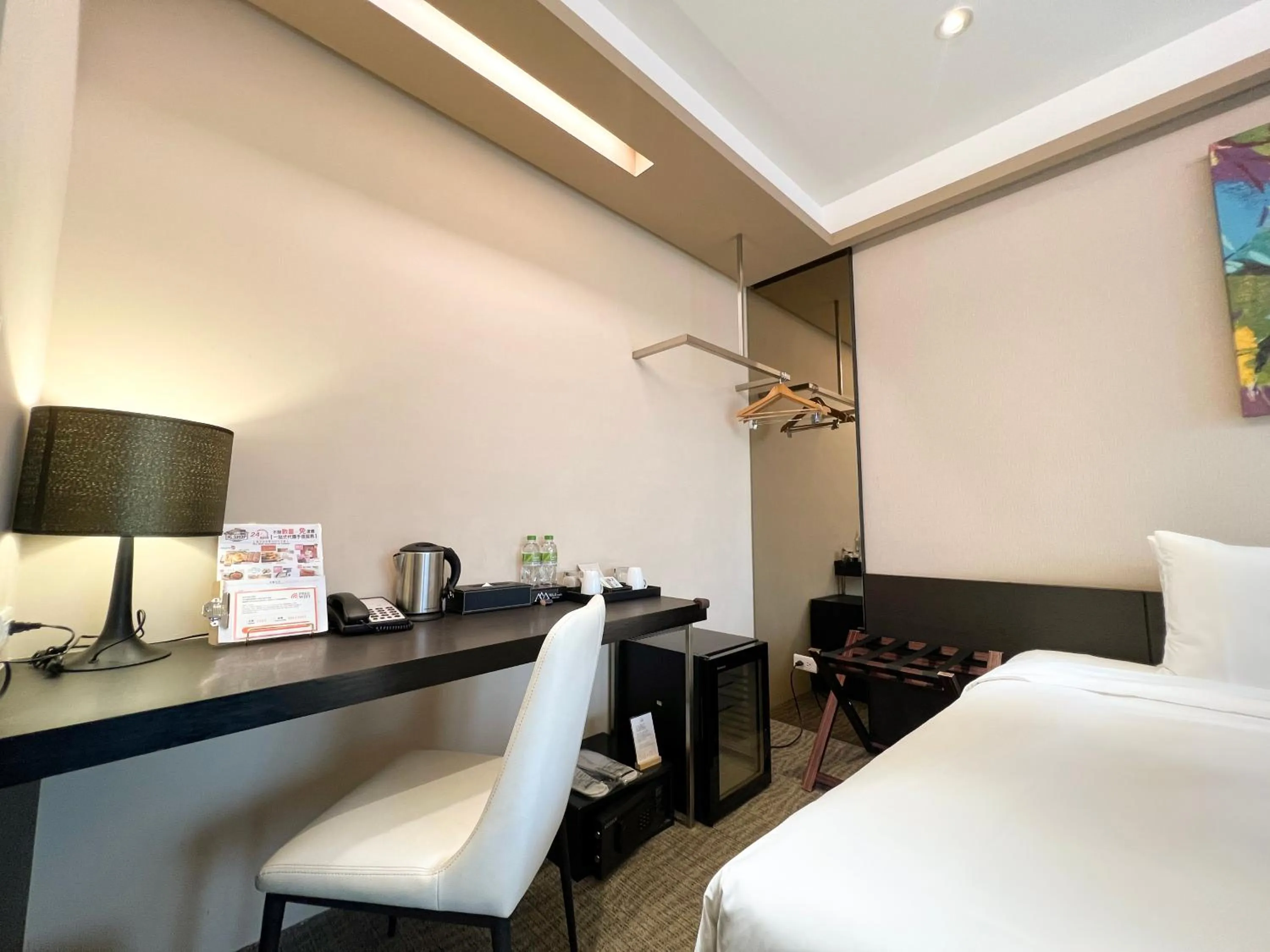 Bedroom in Wallsun Hotel