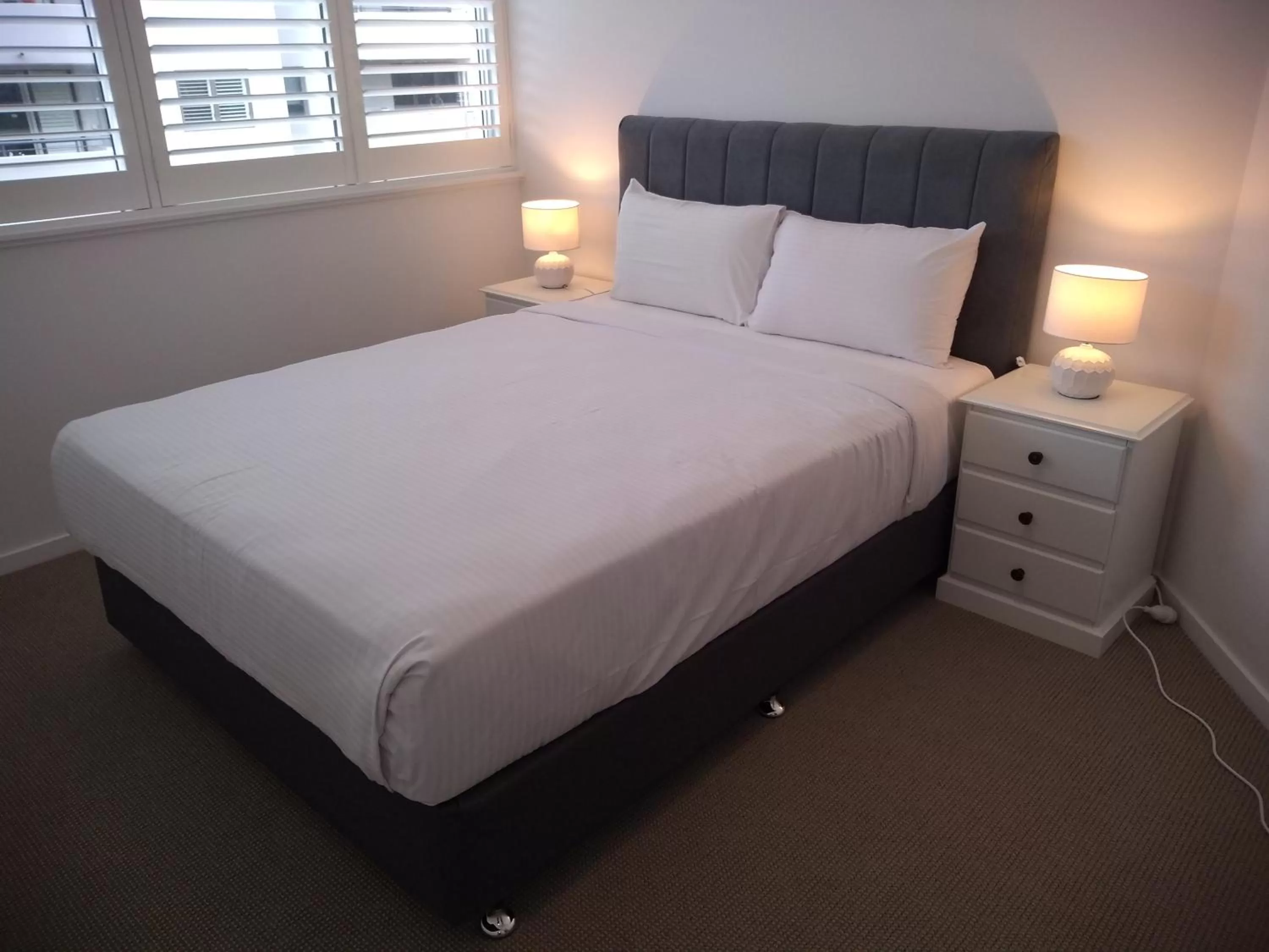 Bed in Chasely Apartment Hotel