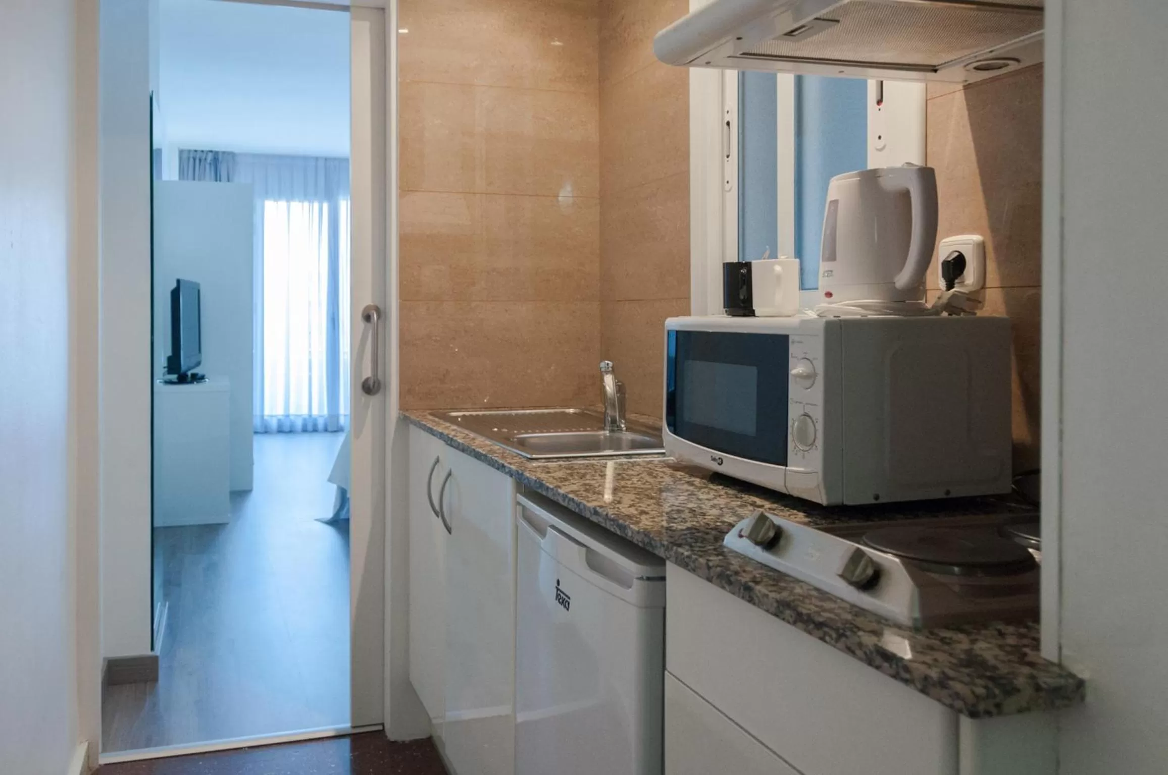 Kitchen or kitchenette in Aparthotel Atenea Calabria