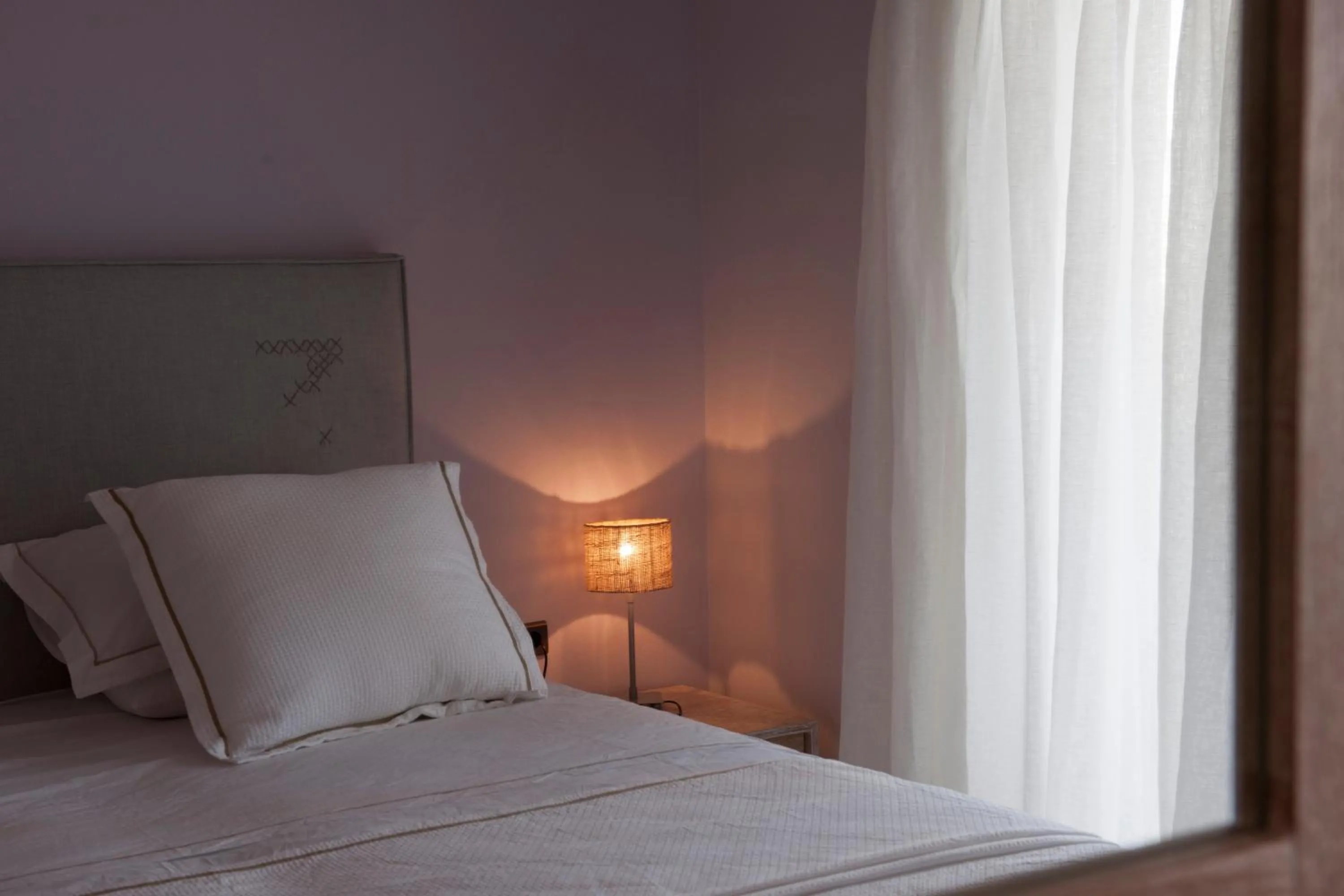 Decorative detail, Bed in Ammos Naxos Exclusive Apartments & Studios