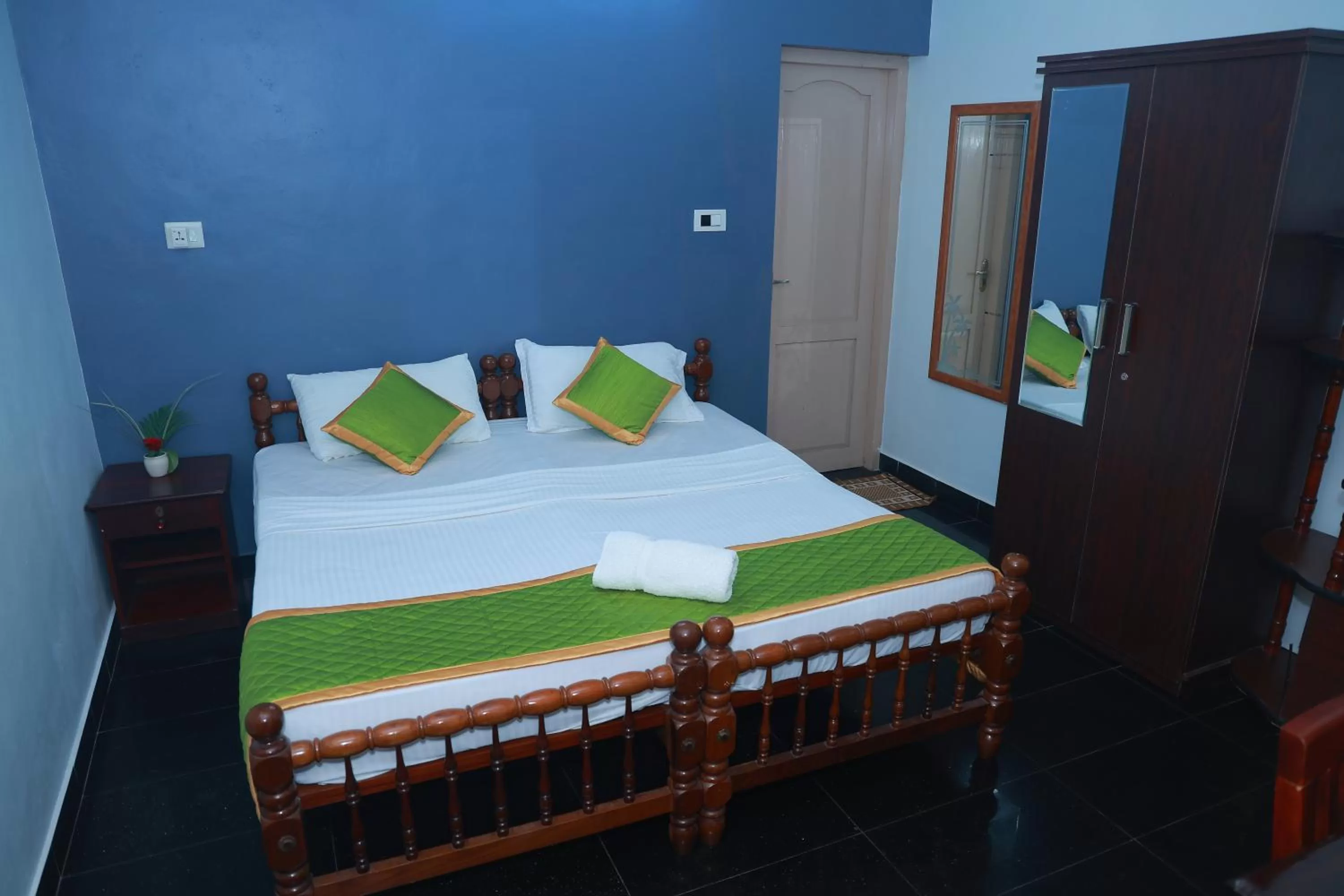 Bed in Ideal Ayurvedic Resort Kovalam