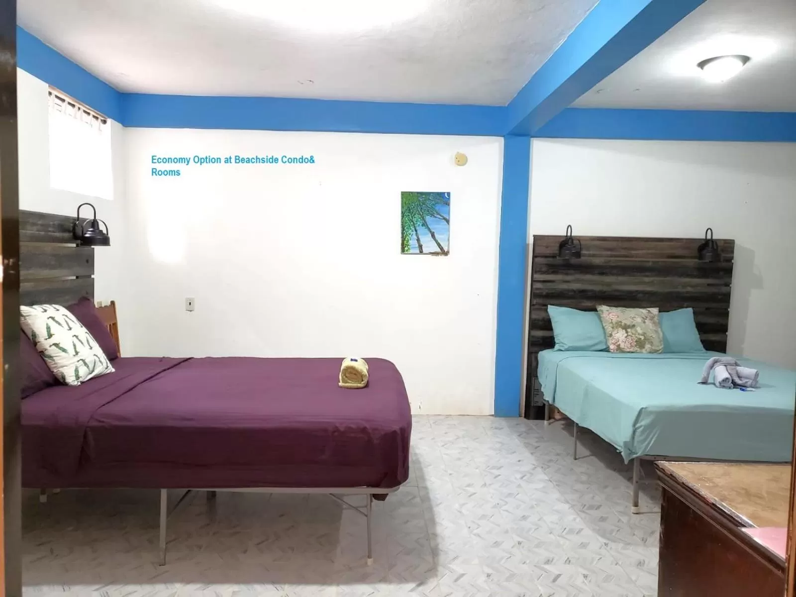 Economy Quadruple Room in Beach Side Condos Caye Caulker by CCVH