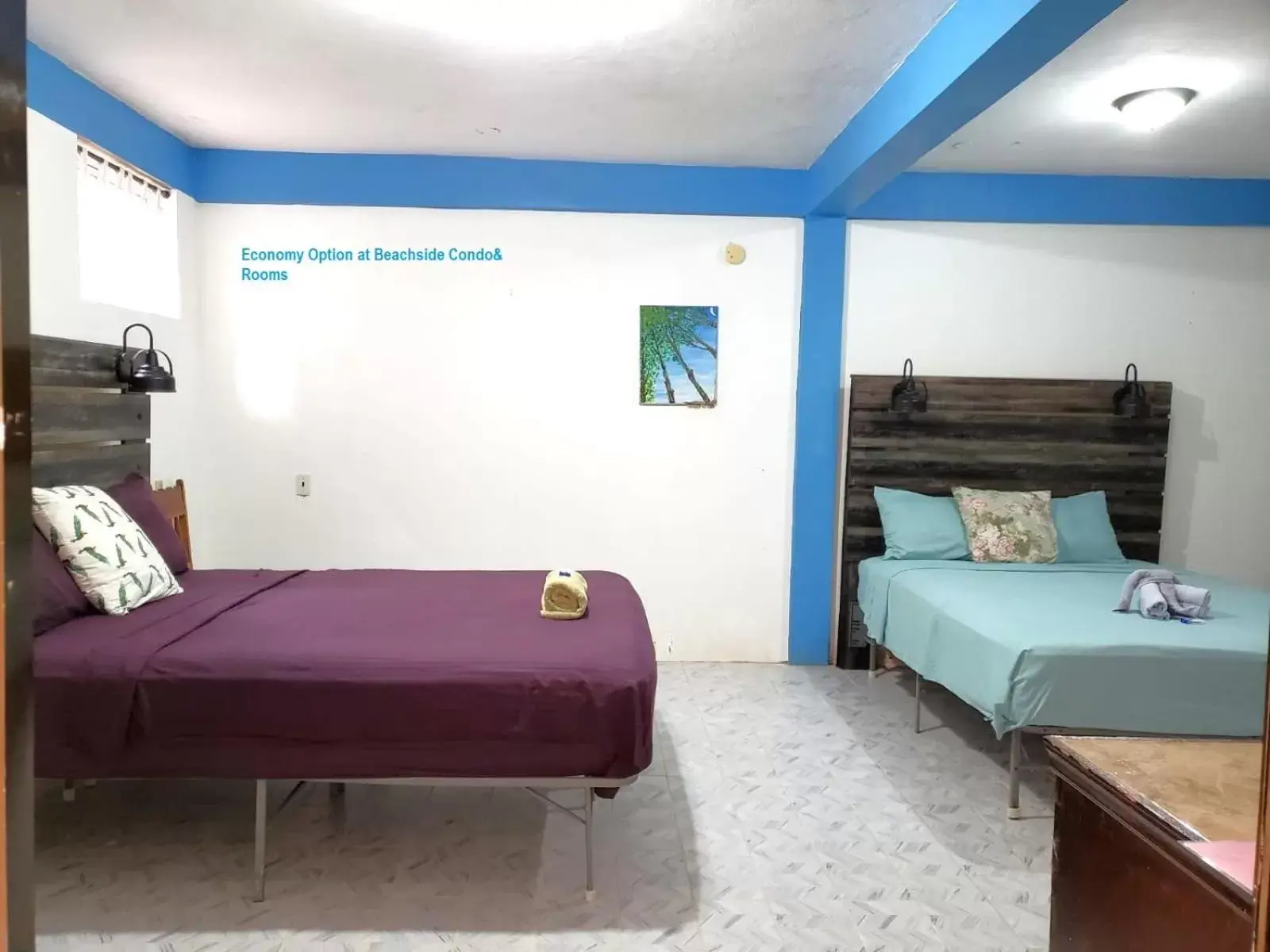 Economy Quadruple Room in Beach Side Condos Caye Caulker by CCVH Economy Quadruple Room in Beach Side Condos Caye Caulker by CCVH