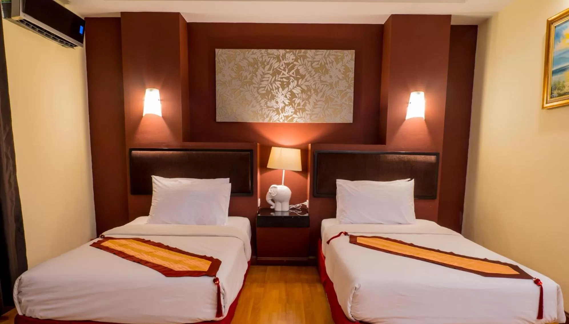 Bed in Atrium Boutique Hotel