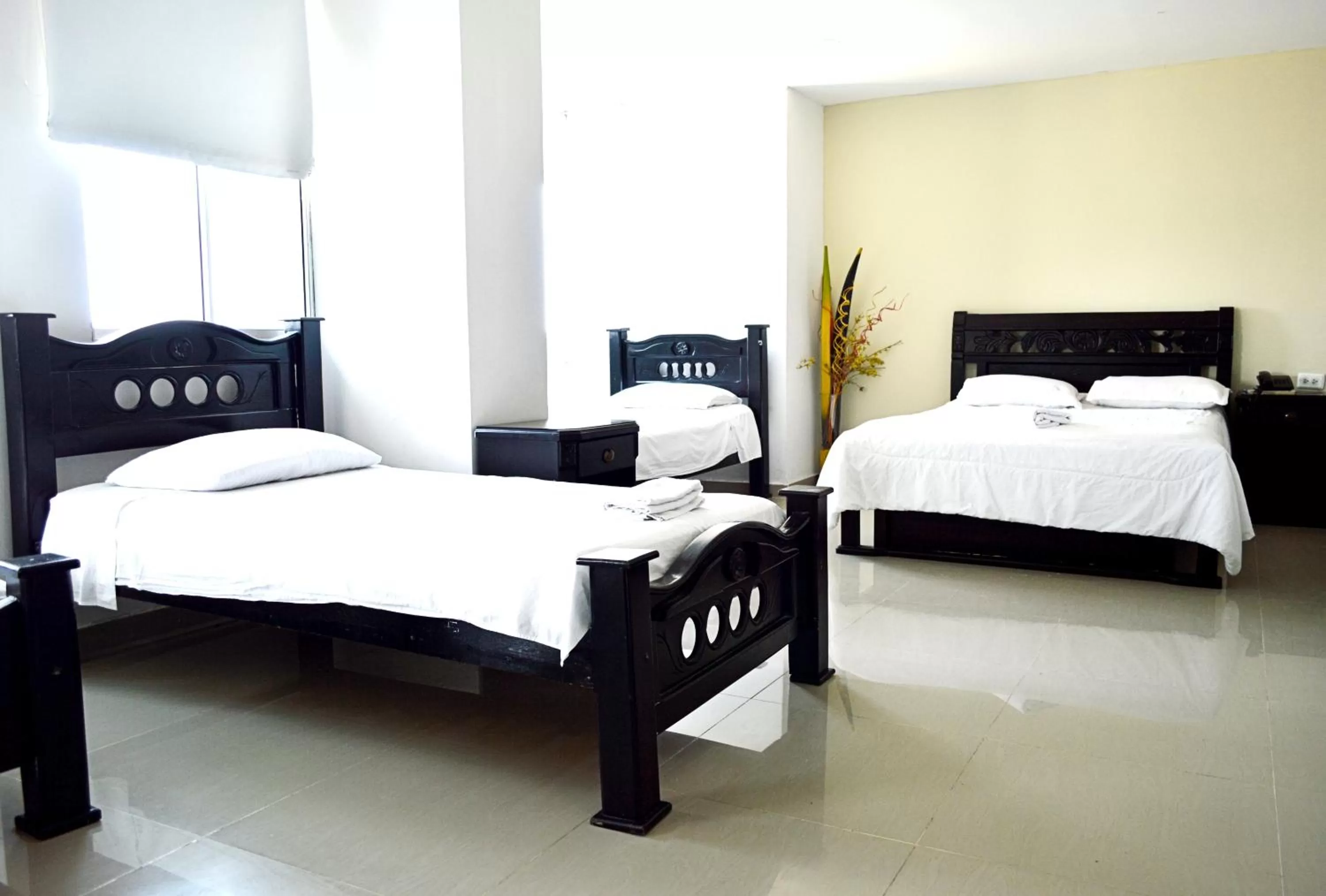 Bed in Hotel Intersuites