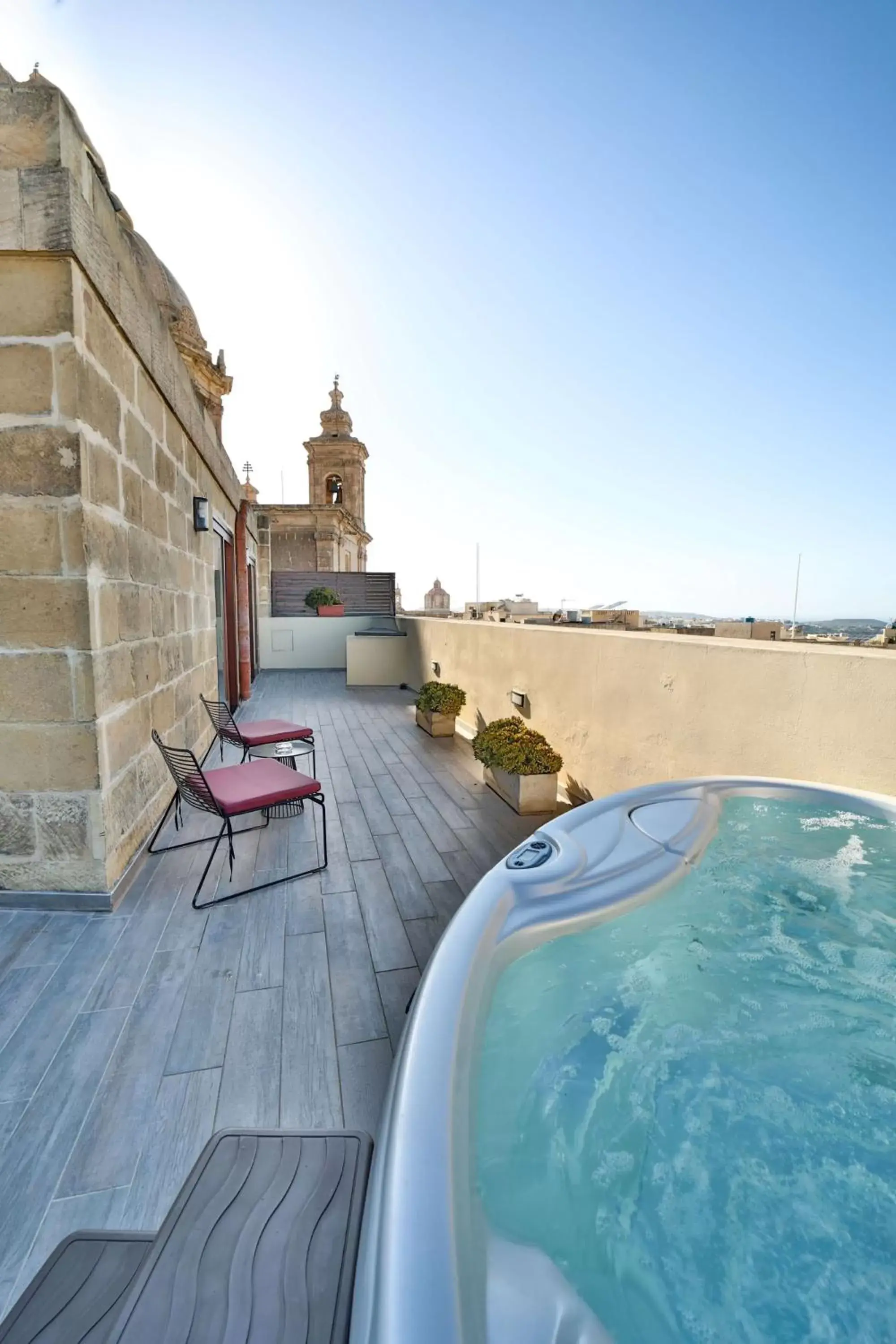 Penthouse Suite with Outdoor Jacuzzi in Quaint Boutique Hotel Nadur Penthouse Suite with Outdoor Jacuzzi in Quaint Boutique Hotel Nadur