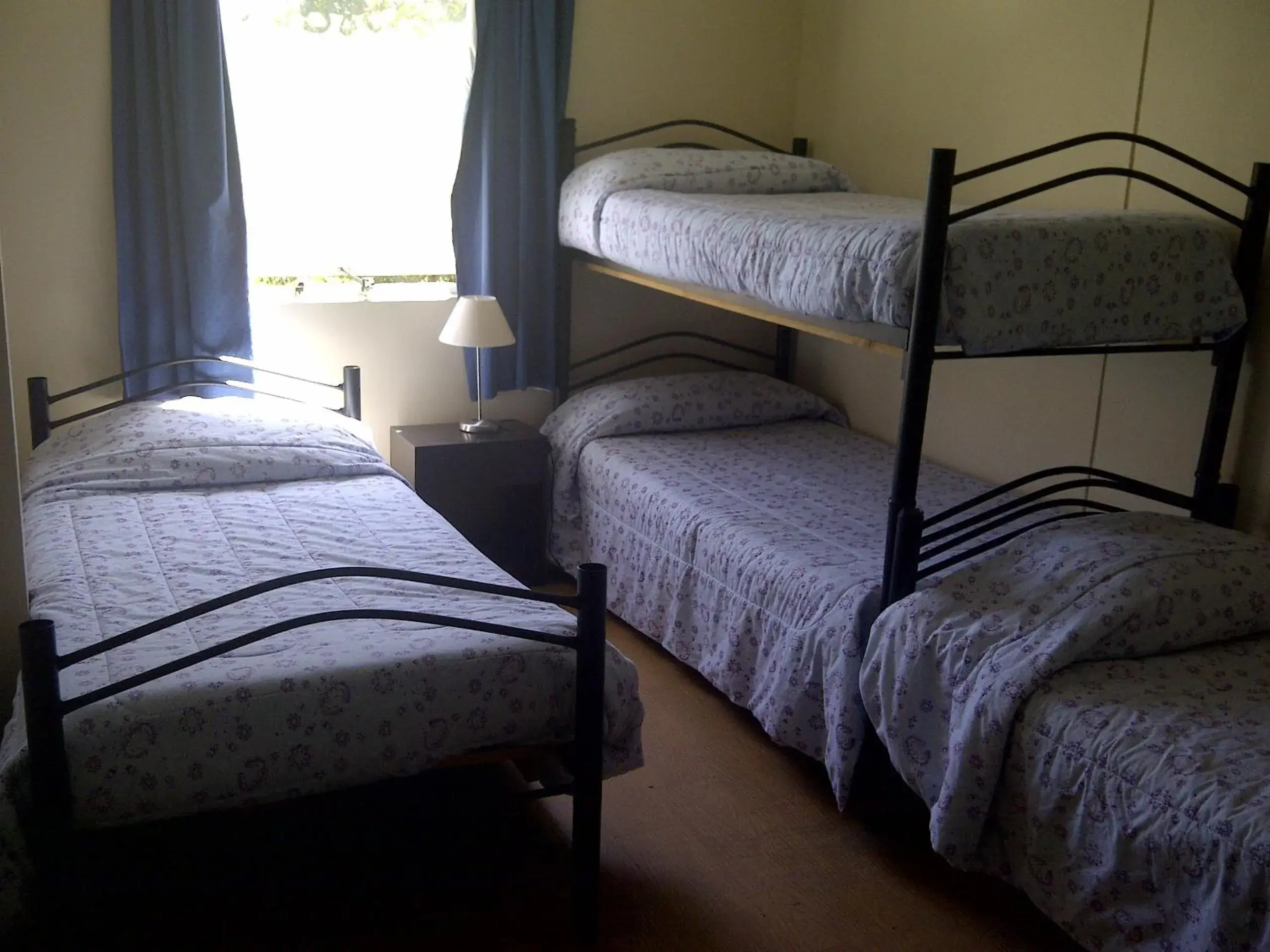 Basic Triple Room with Shared Bathroom in Hostal Americano Basic Triple Room with Shared Bathroom in Hostal Americano