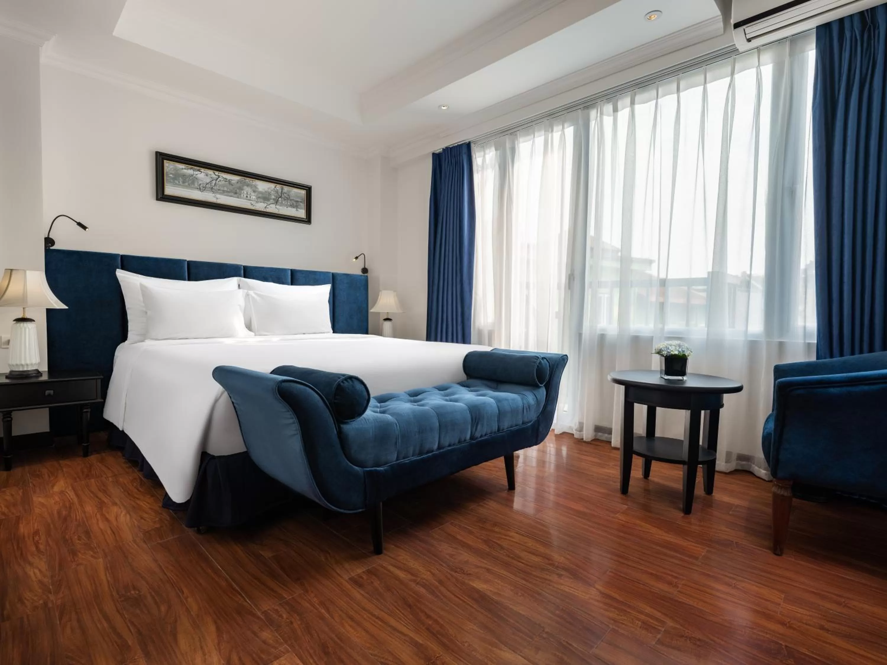 Bed in The Flower Boutique Hotel & Travel