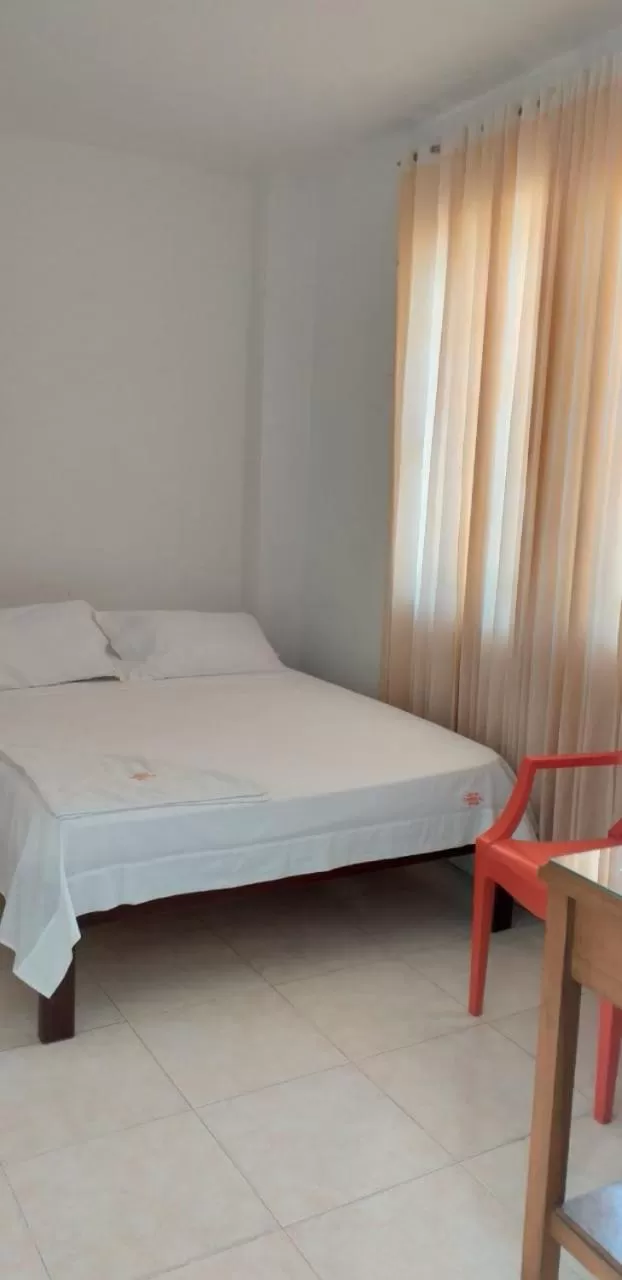 Photo of the whole room, Bed in Hotel Comercial Neiva