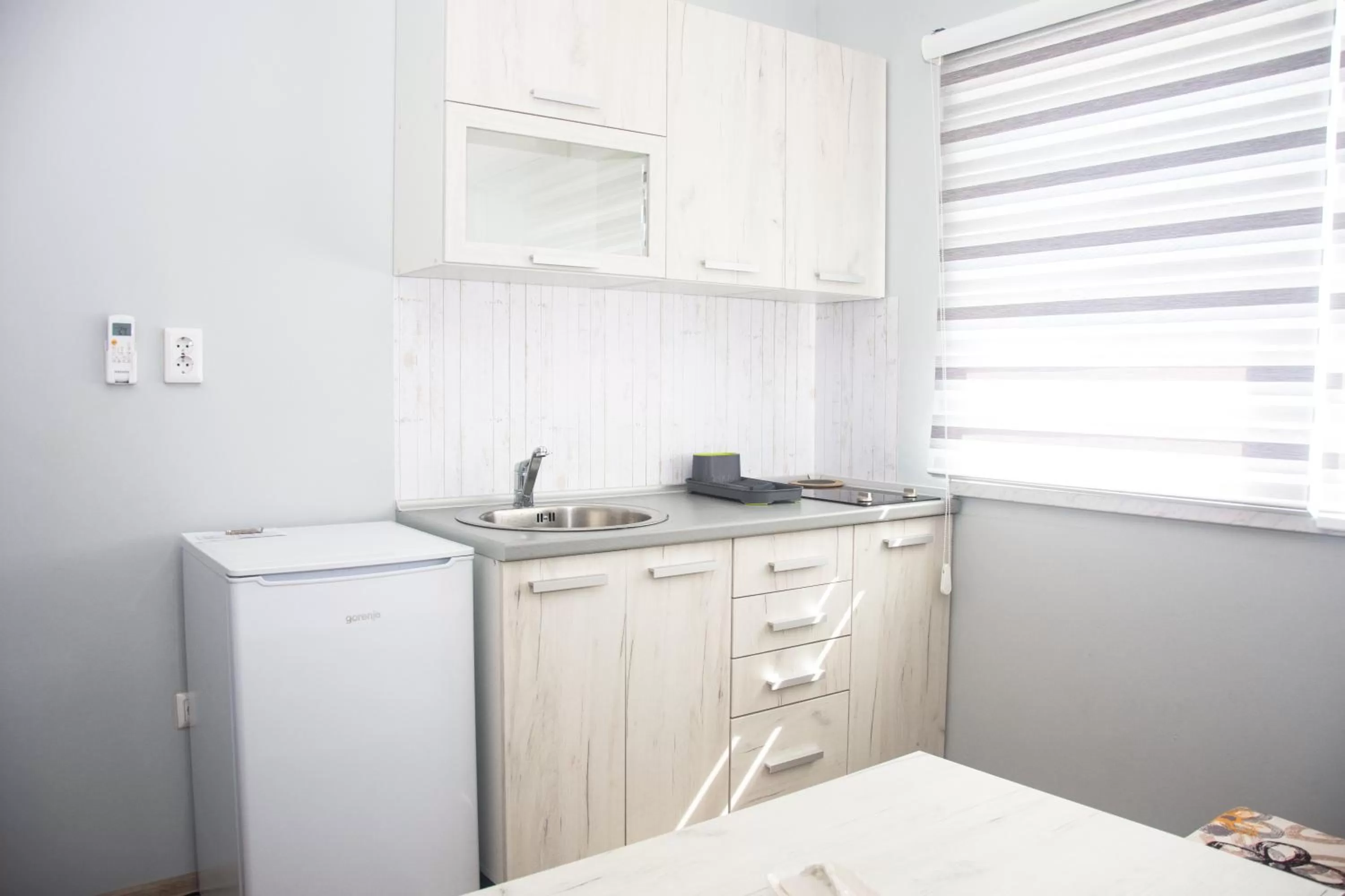 Kitchen/Kitchenette in Motel Aura