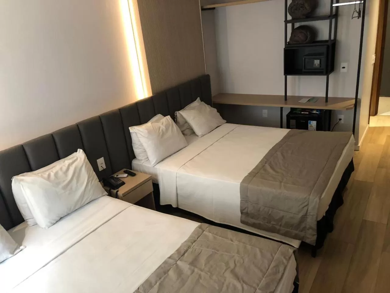 Bed in Regency Copacabana Hotel