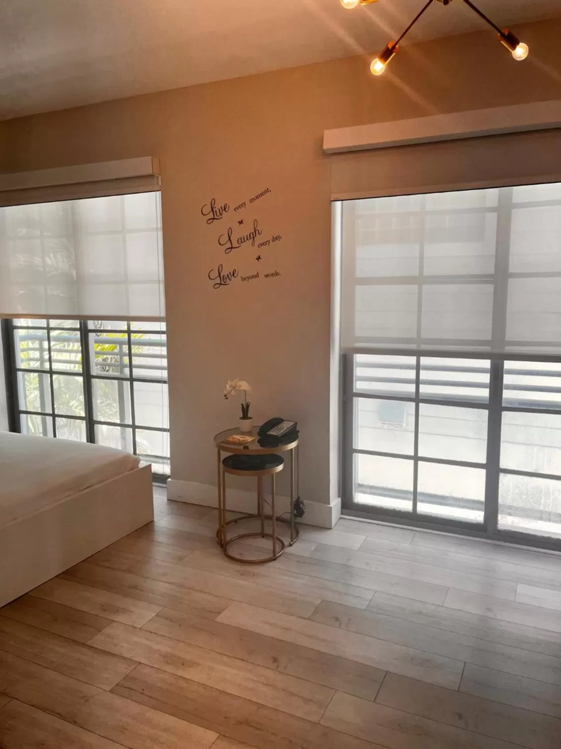 Bedroom, Seating Area in Suites at The Strand on Ocean Drive