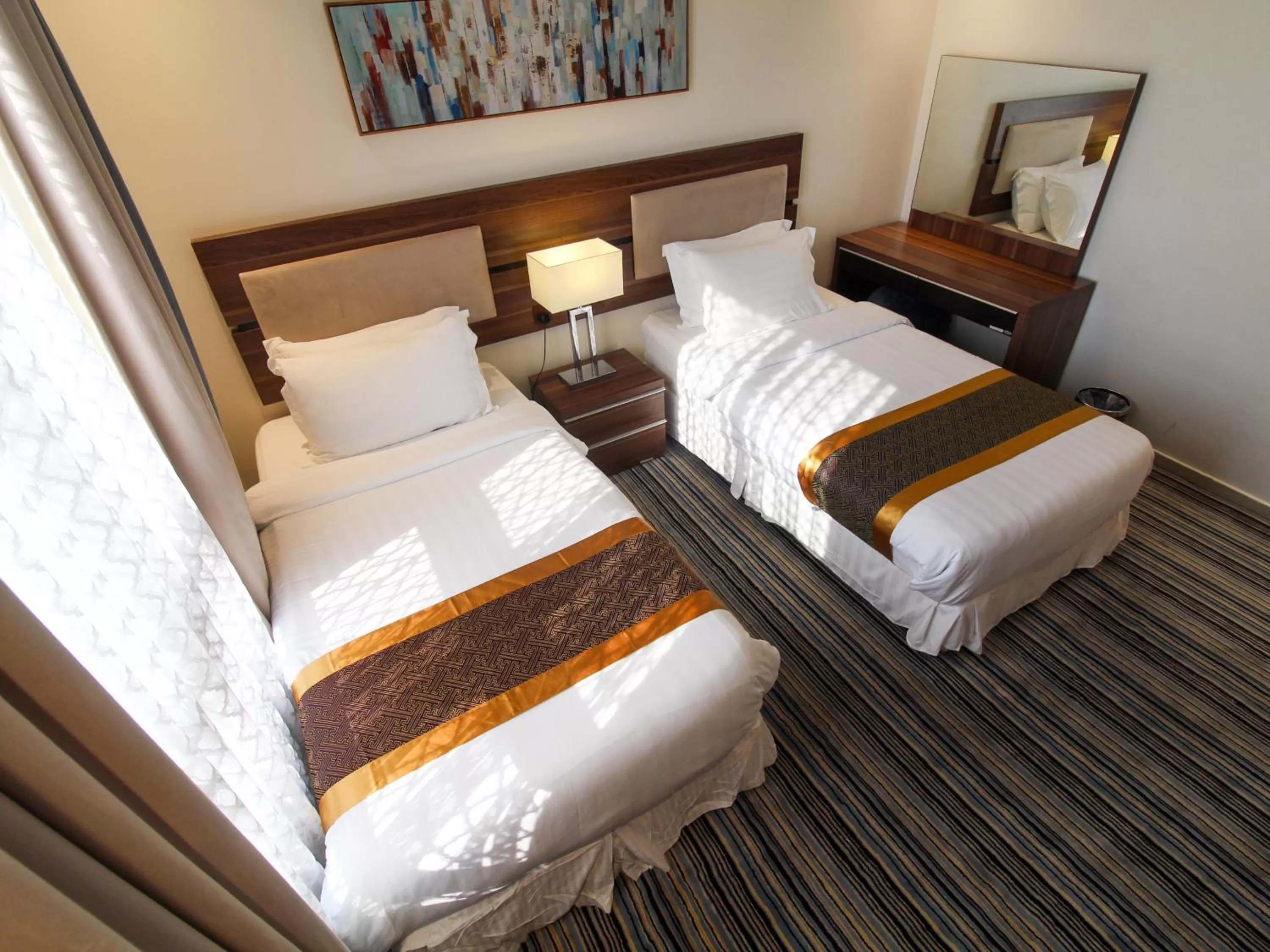 Bed in Friesian Hotel Suites